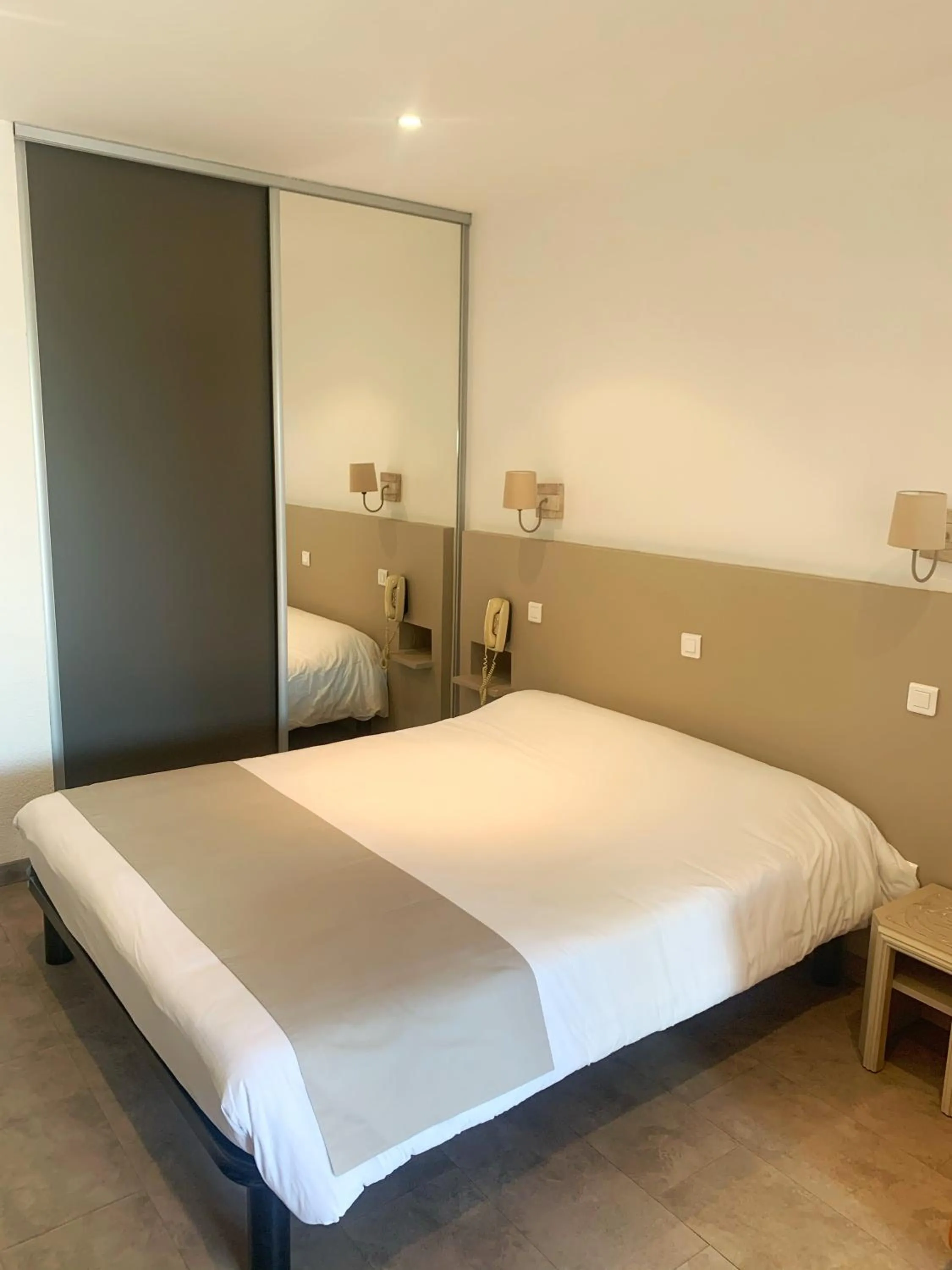 Bedroom in Hôtel Beau Soleil