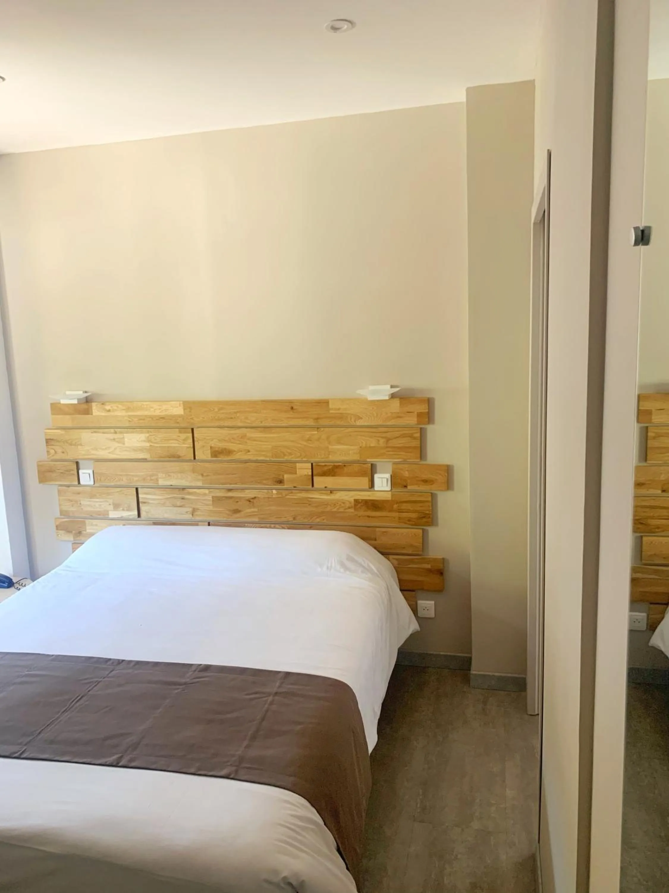 Bed in Hôtel Beau Soleil