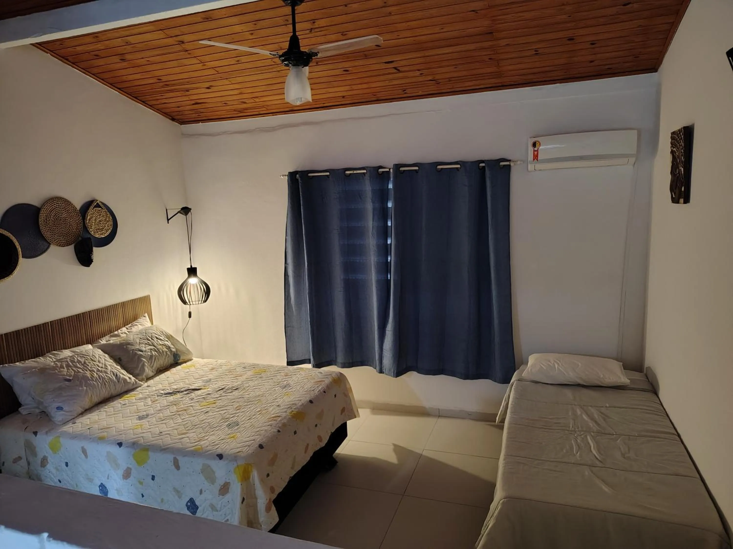 Bed in Villa Bali Maresias Lofts
