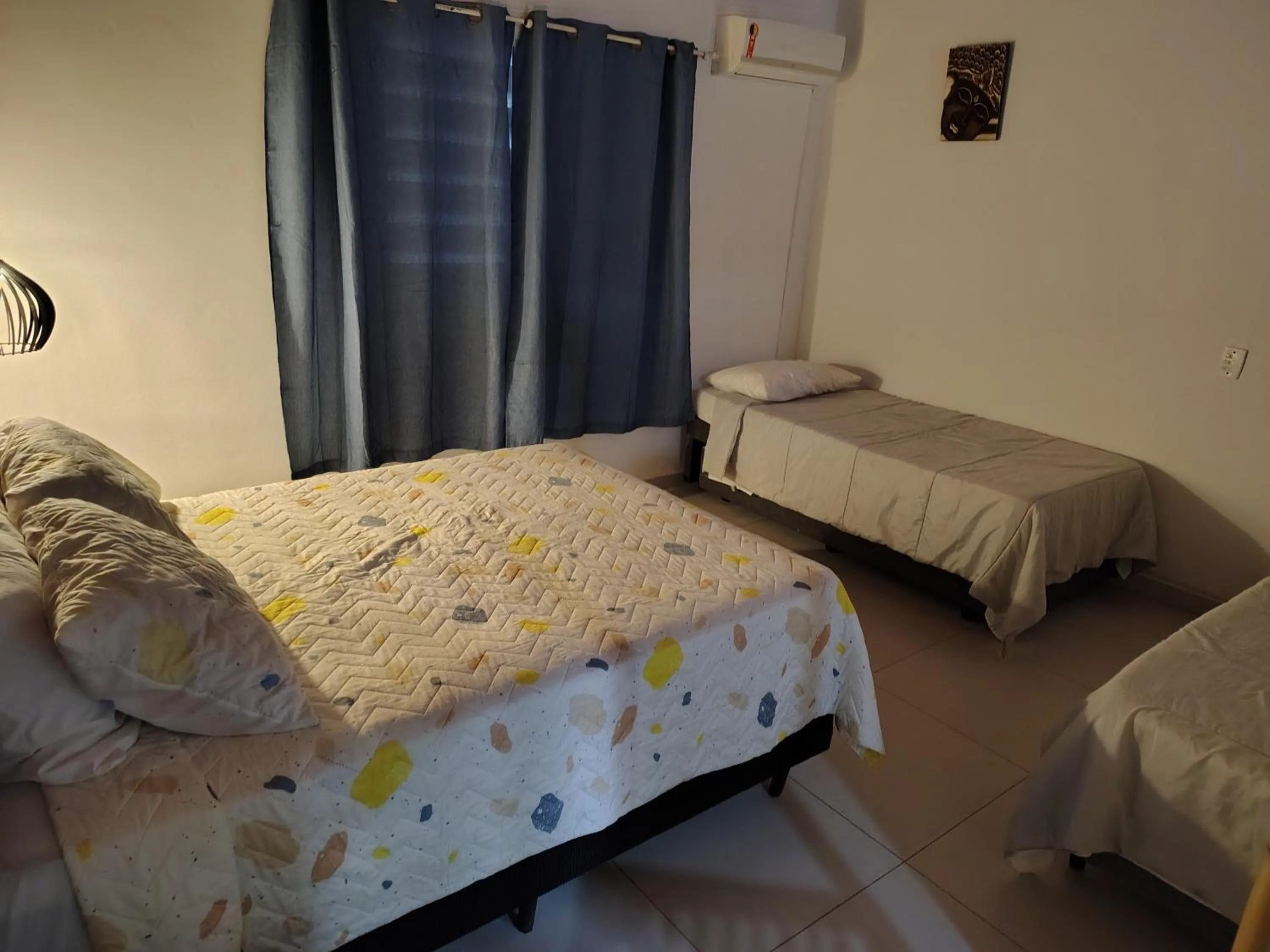 Bed in Villa Bali Maresias Lofts