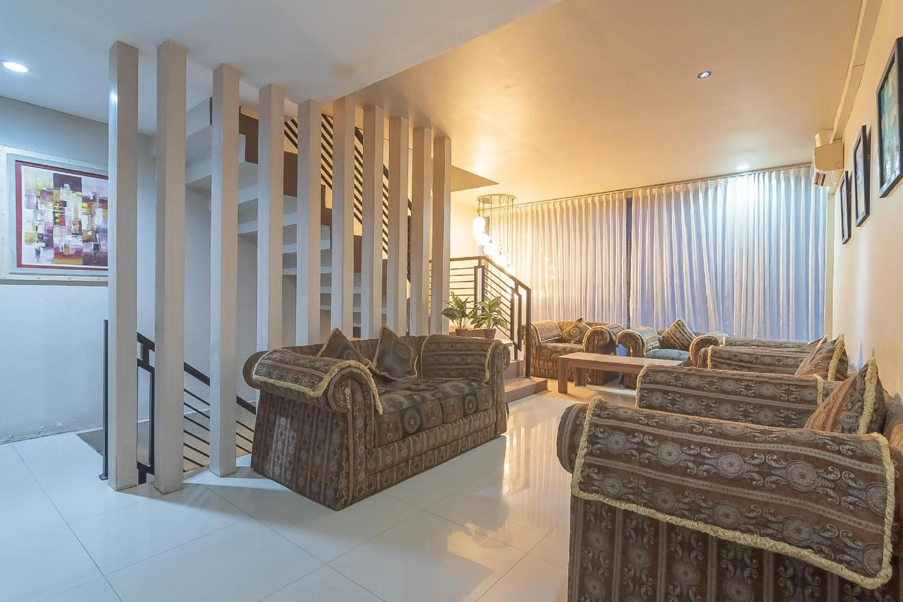 Living room in RedDoorz Plus near Sepinggan Airport 3 Balikpapan