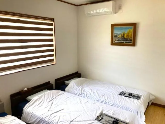 Bed in Yufuin-Sanso Waremokou