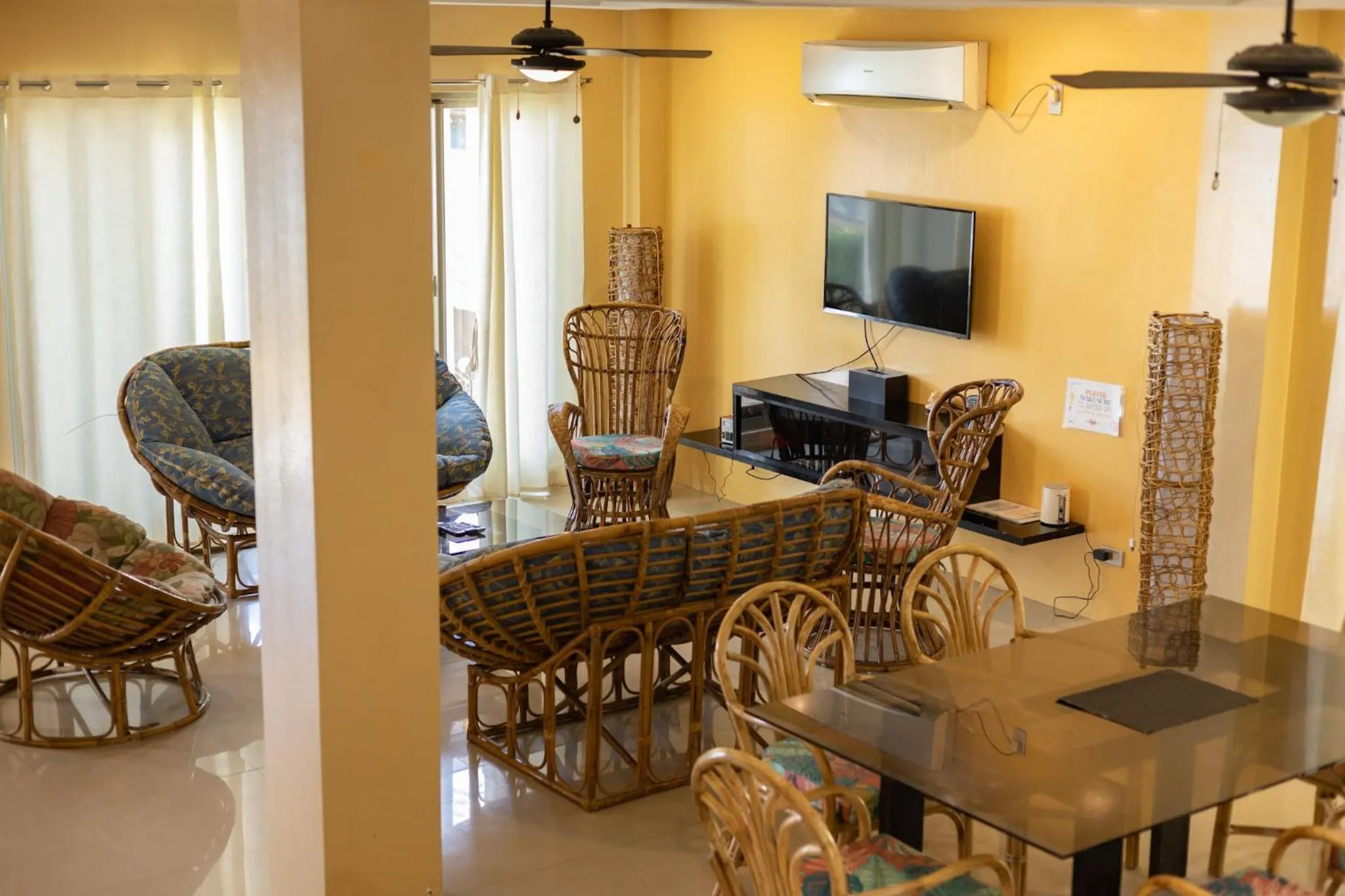 Communal lounge/ TV room in Amami Beachfront Villa with Private Beach