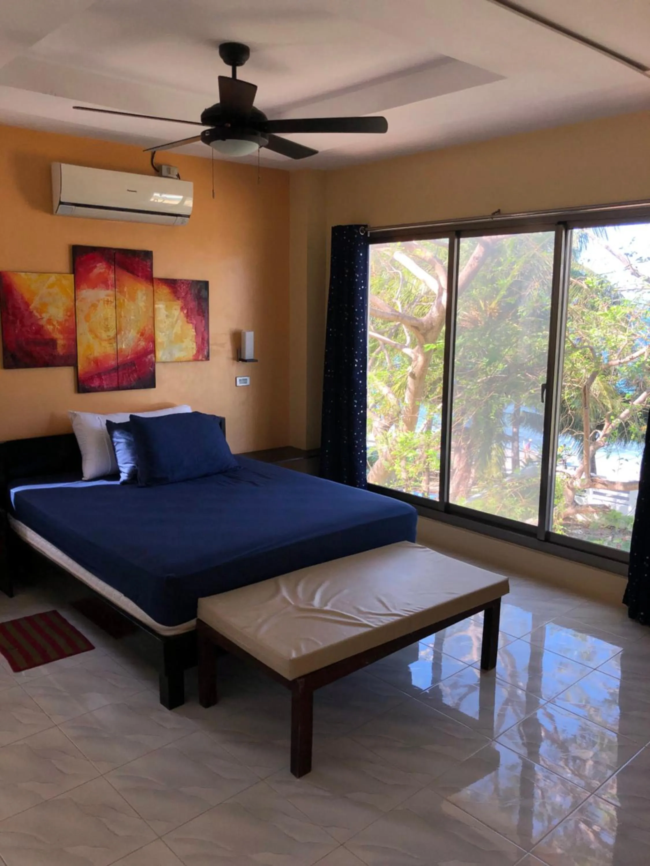 Bed in Amami Beachfront Villa with Private Beach