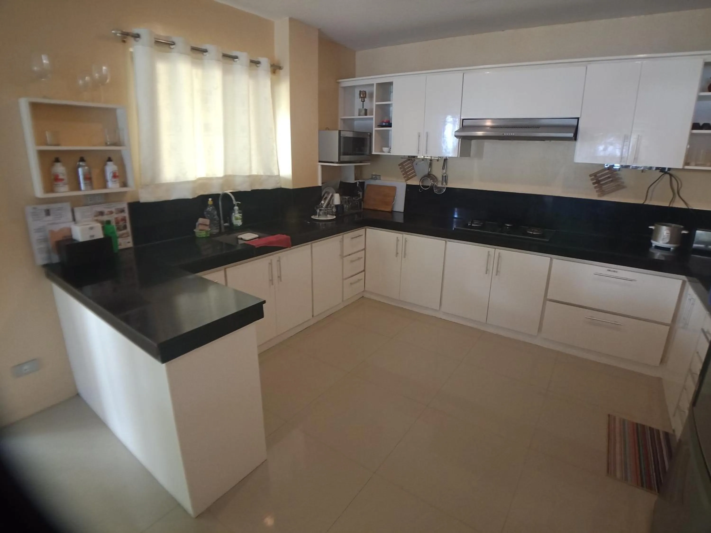 Kitchen or kitchenette in Amami Beachfront Villa with Private Beach