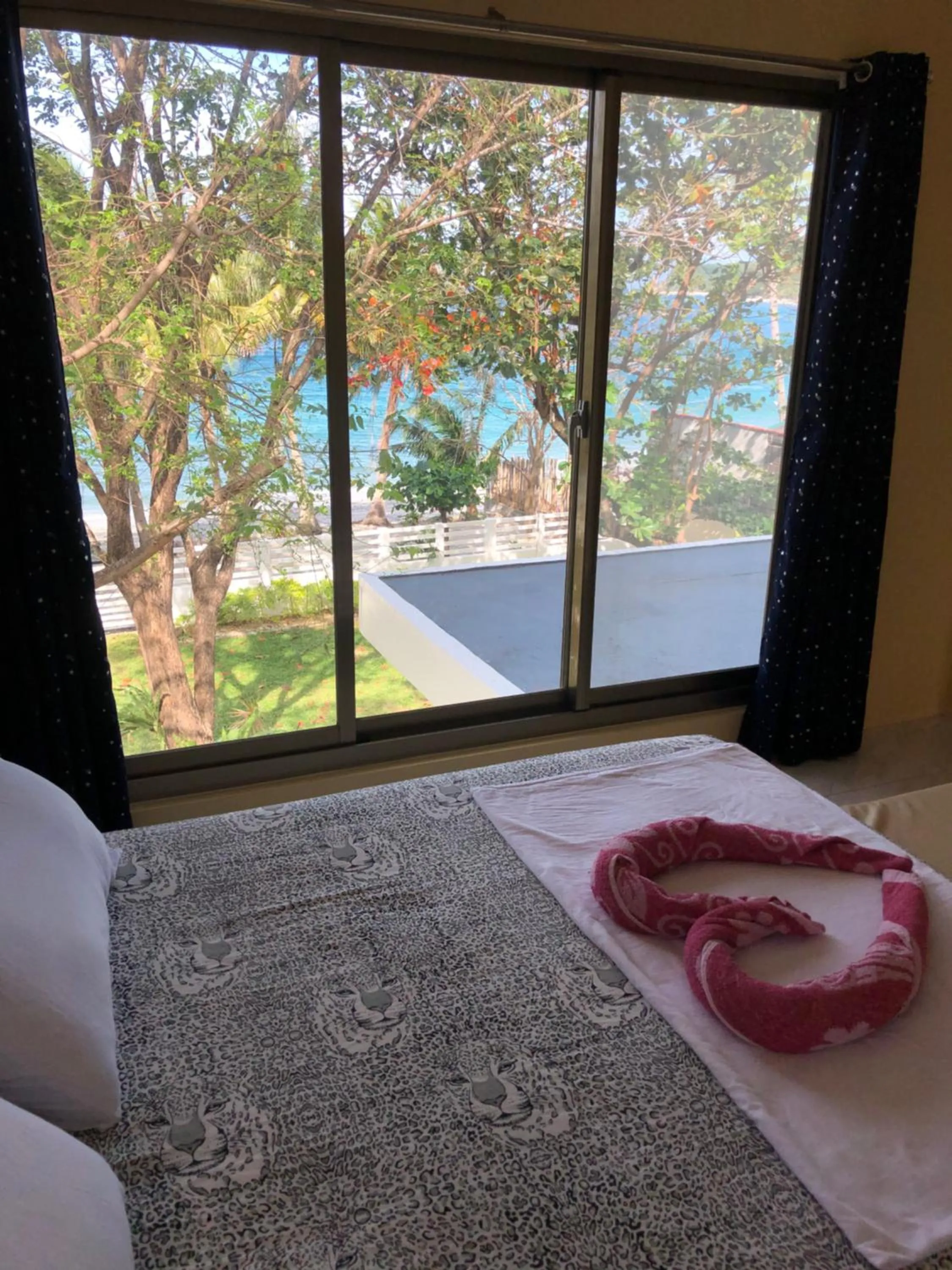 Bed in Amami Beachfront Villa with Private Beach