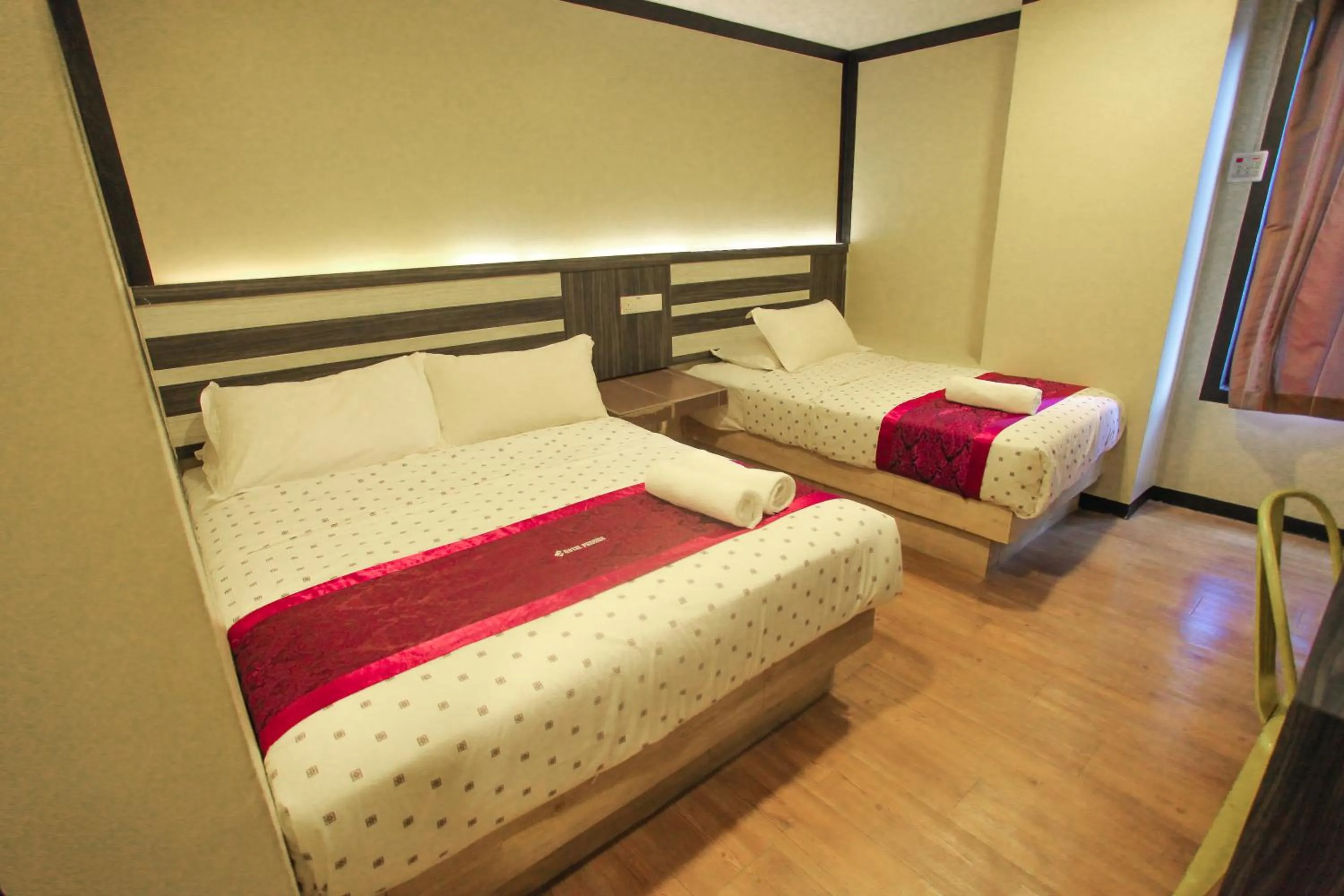 Bed in HOTEL PREMIUM