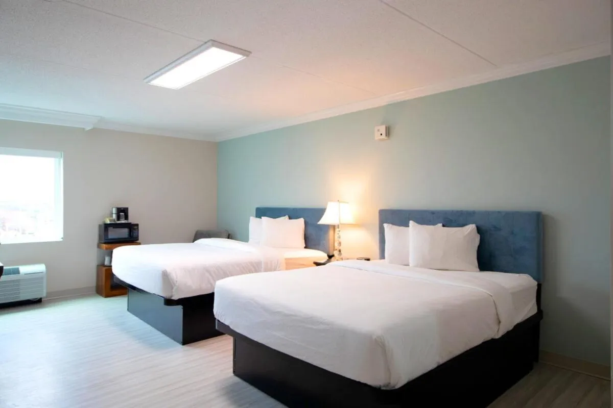 Bed in Bella Vista Hotel & Suites