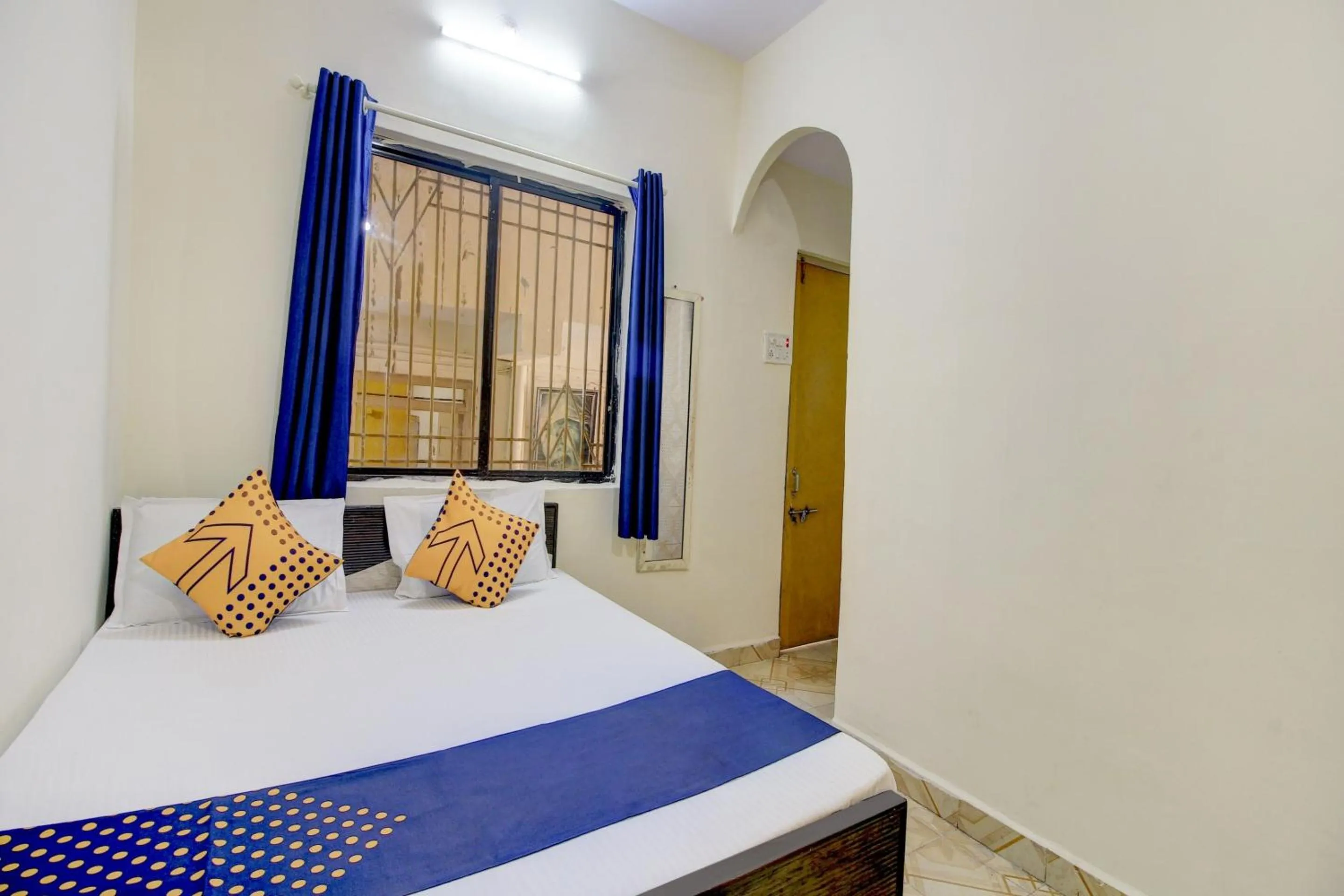 Bedroom in SPOT ON 63695 Hotel Sai Muskaan