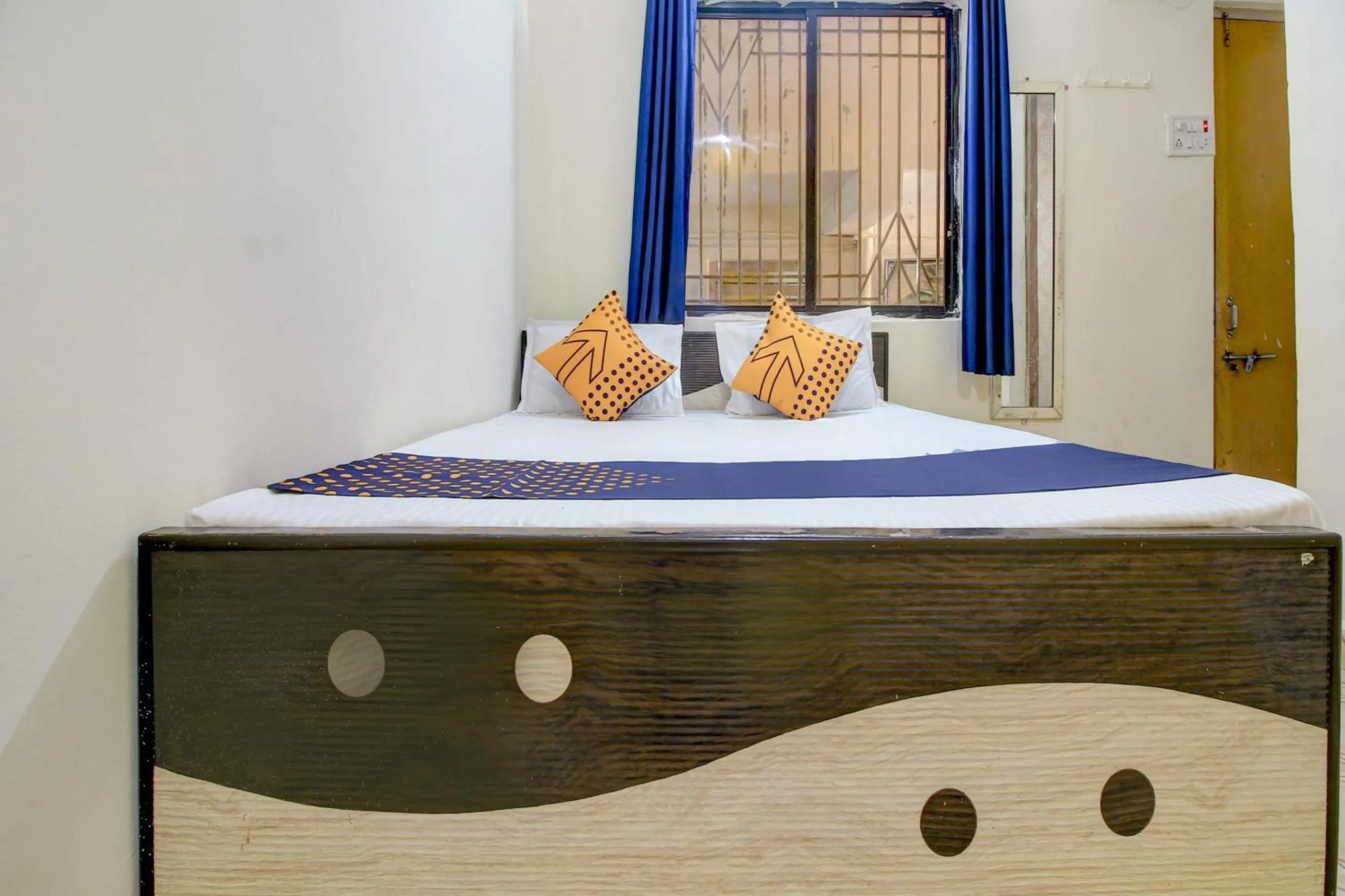 Bedroom in SPOT ON 63695 Hotel Sai Muskaan