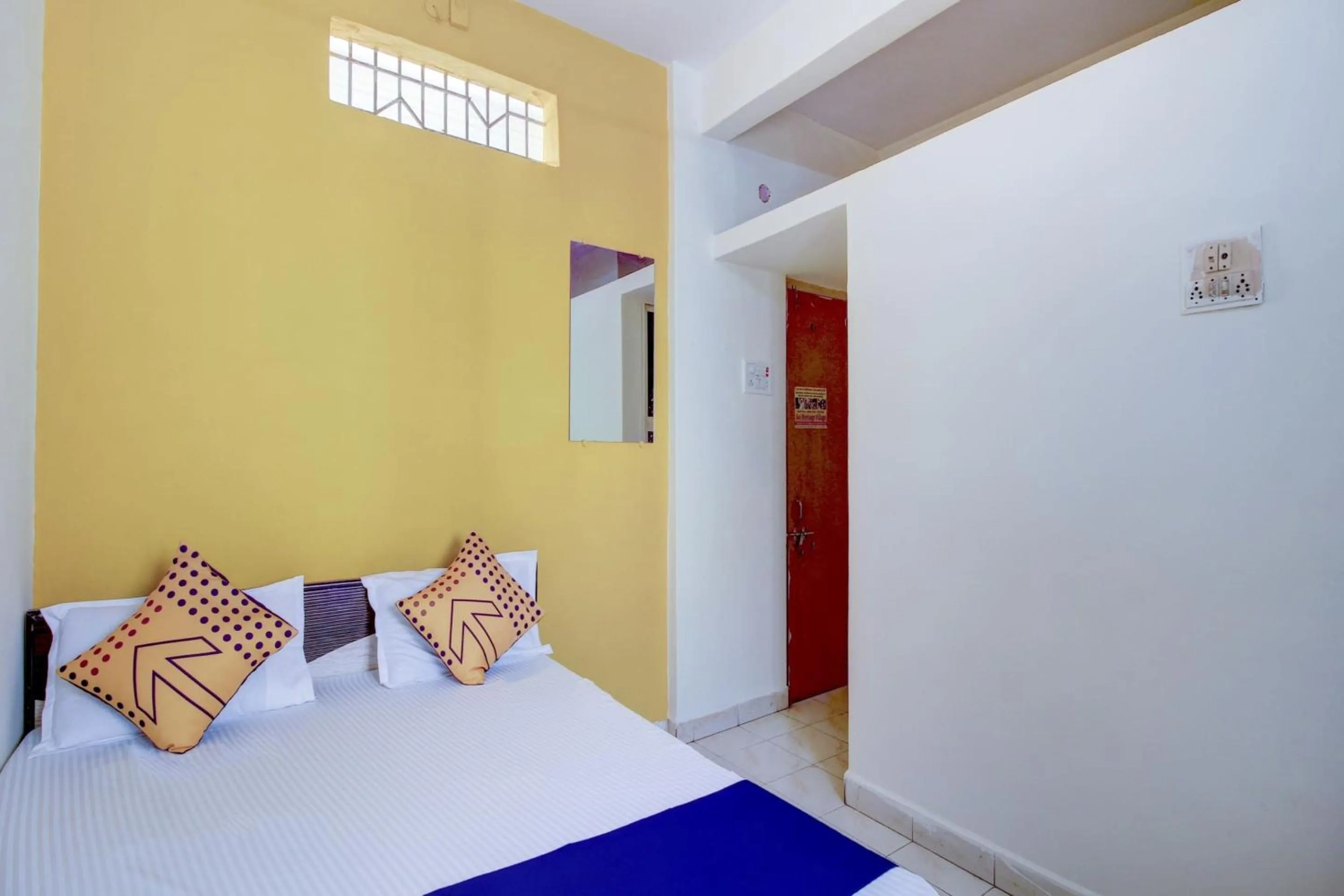 Bedroom in SPOT ON 63695 Hotel Sai Muskaan