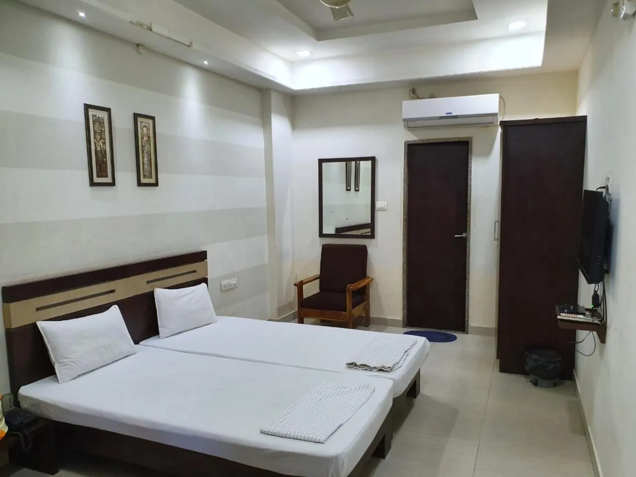 Photo of the whole room, Bed in HOTEL MANUHAR INN