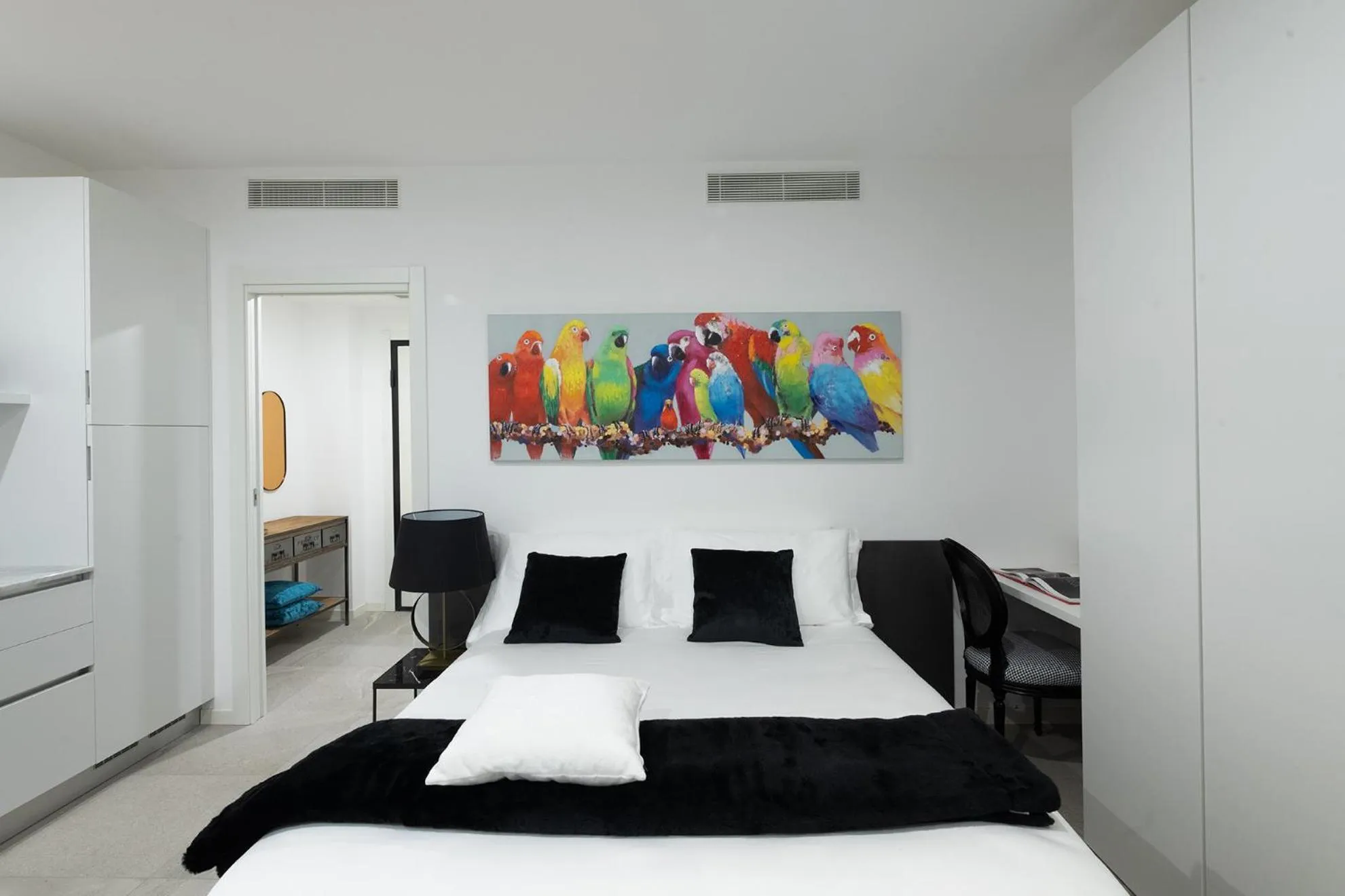 Bed in JOIVY Boutique Apartments Farneti