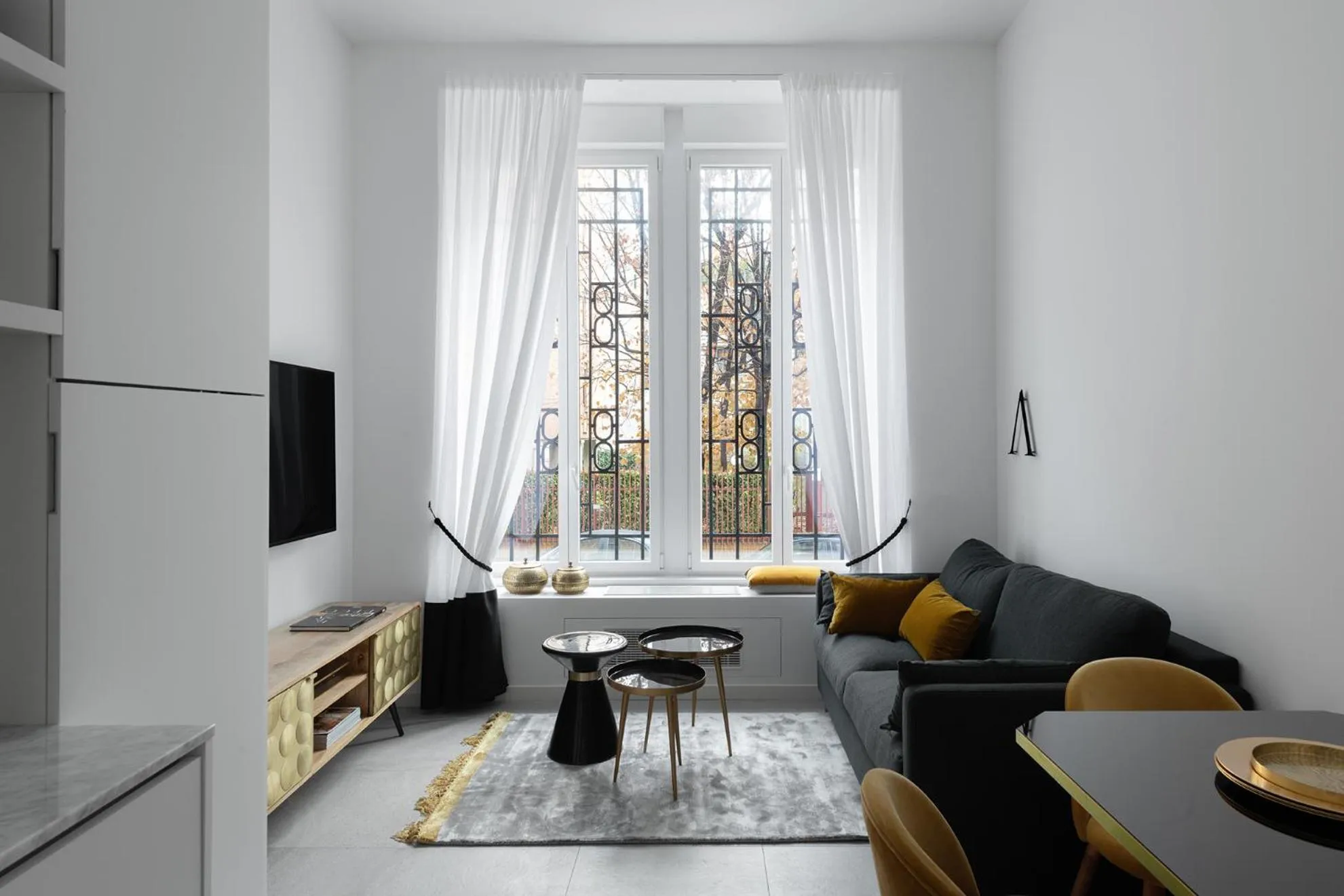 TV and multimedia in JOIVY Boutique Apartments Farneti