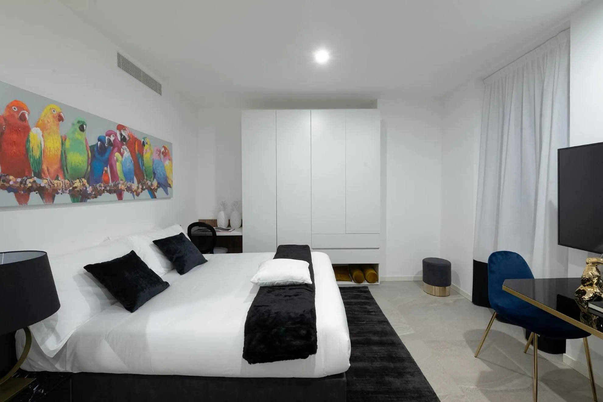 Bed in JOIVY Boutique Apartments Farneti