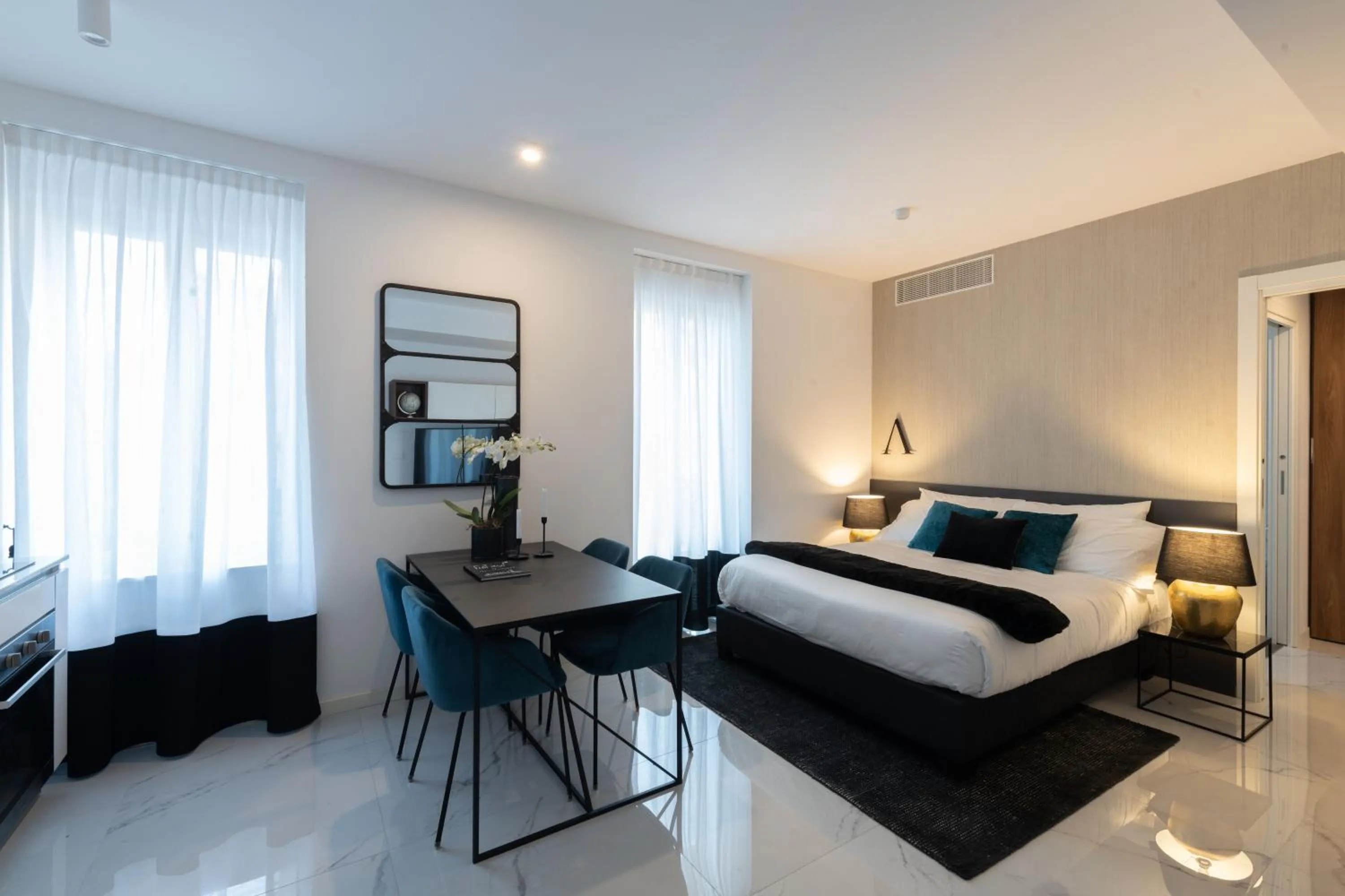 Bed in JOIVY Boutique Apartments Farneti