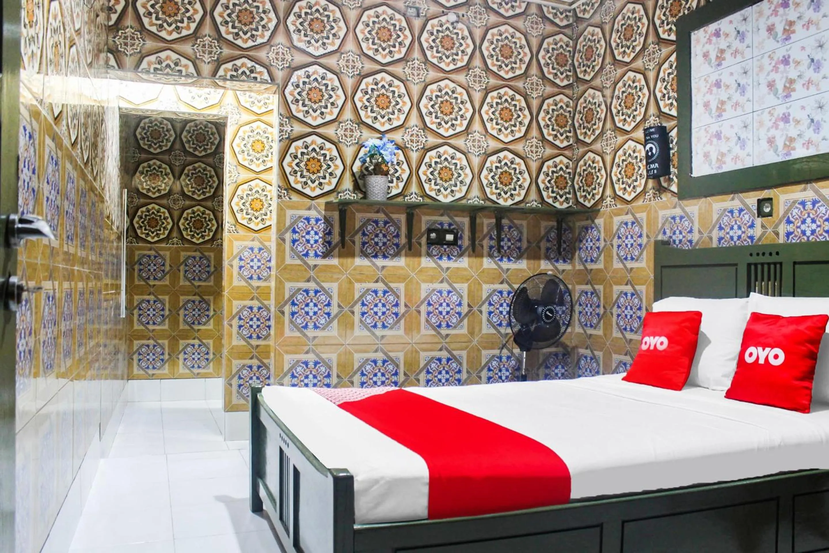 Bedroom in OYO 2518 Wilma Hotel Ii Premier