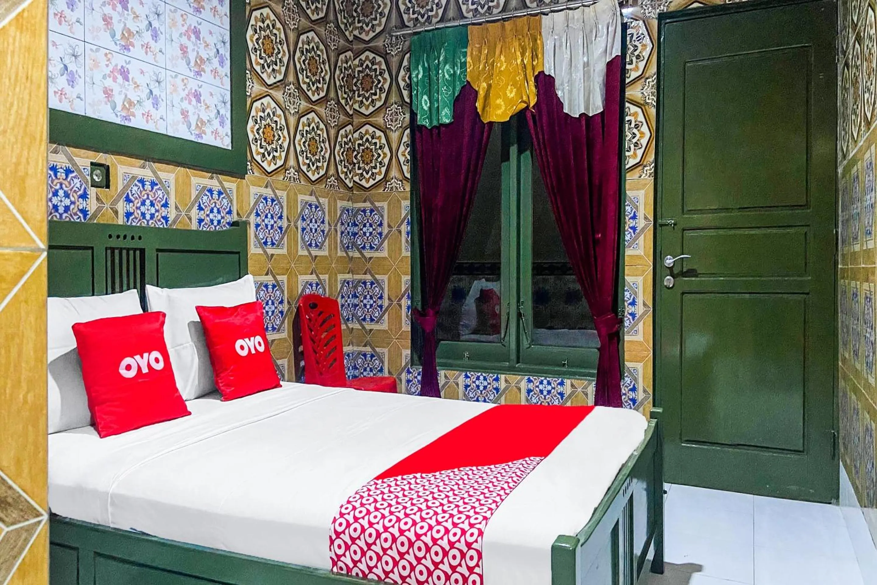 Bedroom in OYO 2518 Wilma Hotel Ii Premier