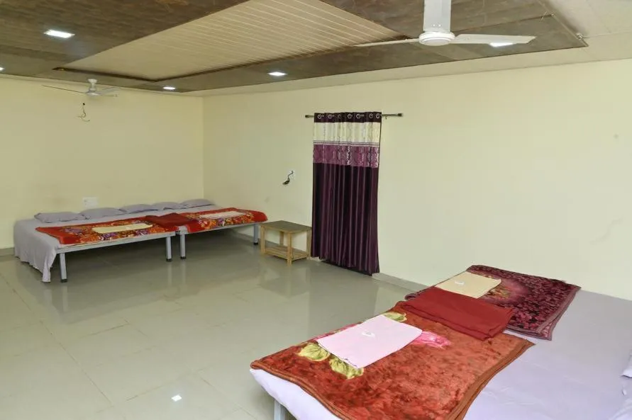 Bed in Shivshrushti Agro Tourism & River Camp Tapola