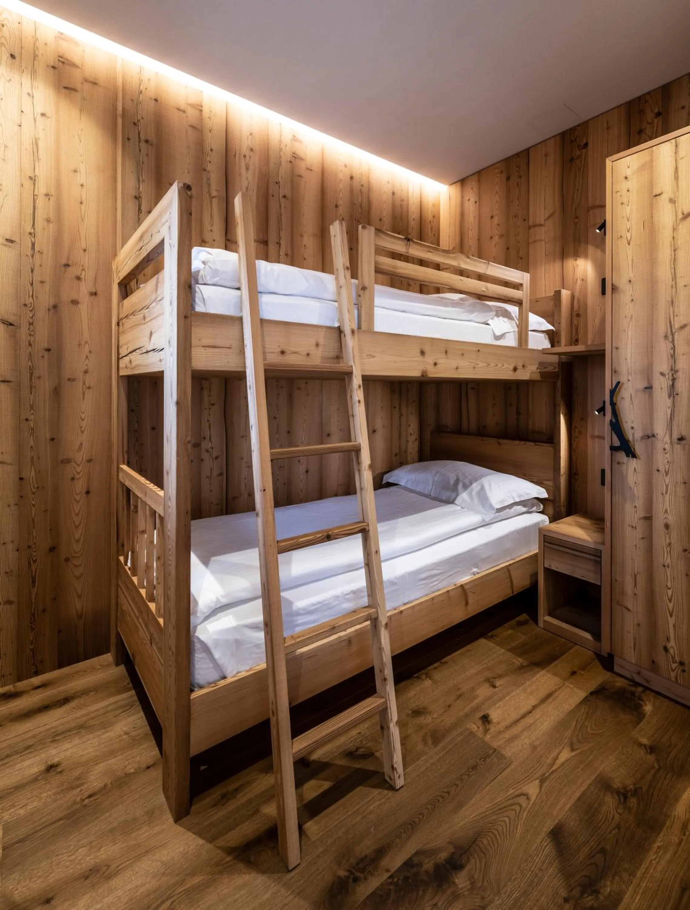 Bed in Ciampedie Luxury Alpine Spa Hotel