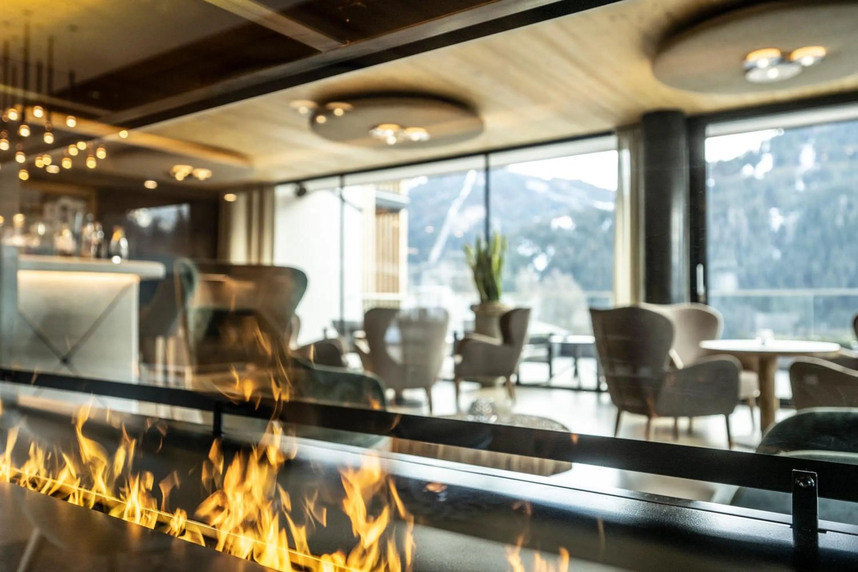 Lounge or bar in Ciampedie Luxury Alpine Spa Hotel