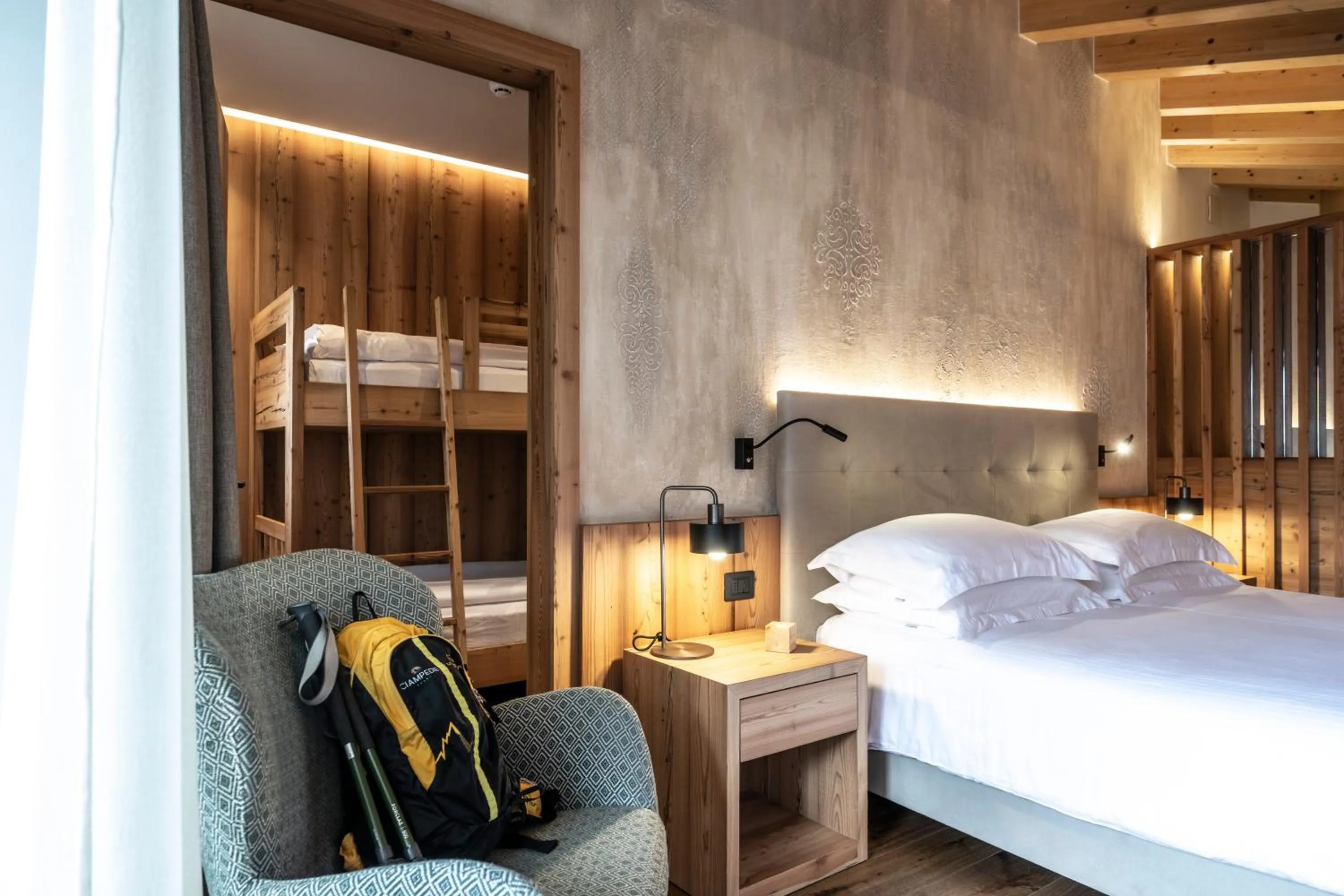 Bed in Ciampedie Luxury Alpine Spa Hotel