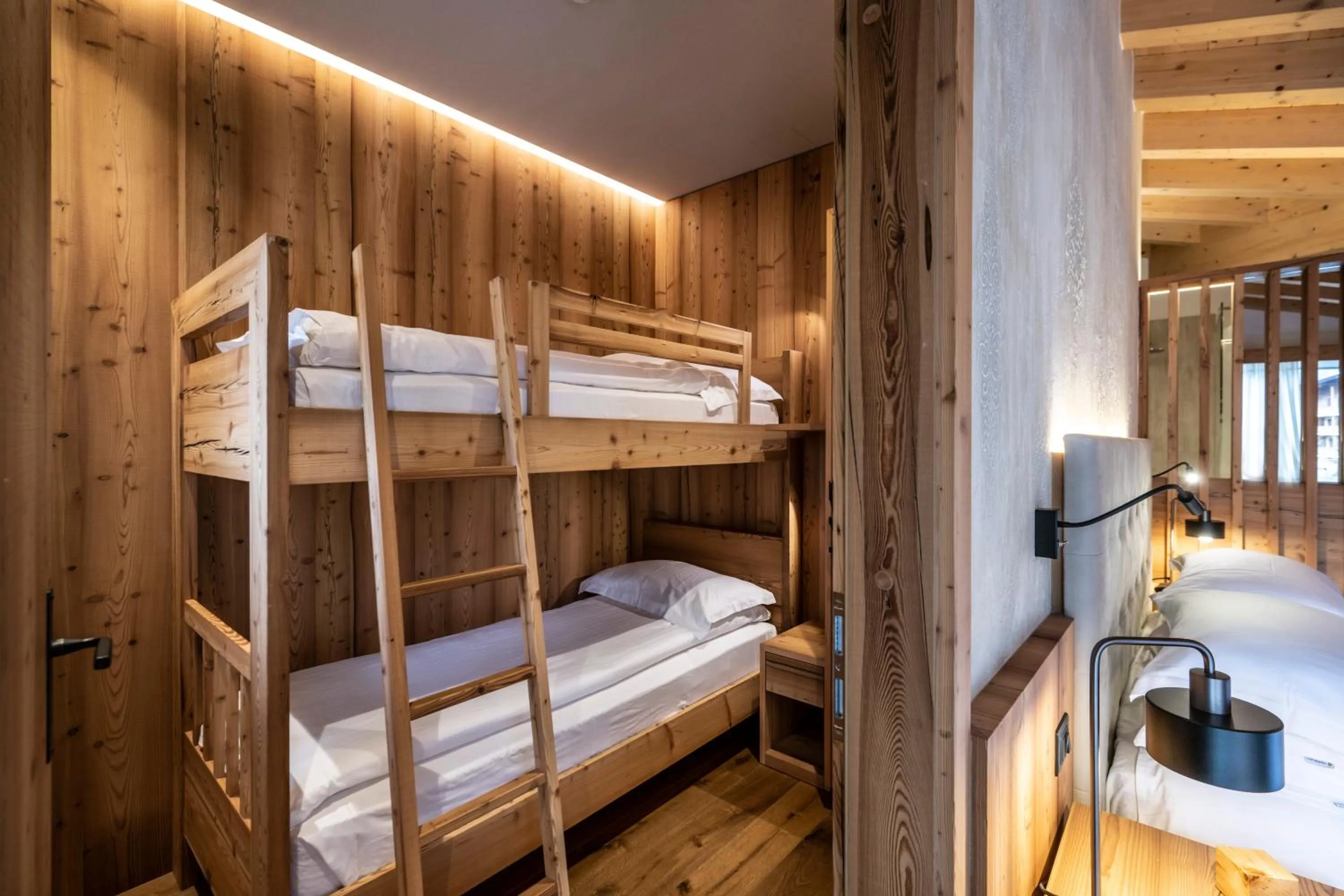 Bed in Ciampedie Luxury Alpine Spa Hotel