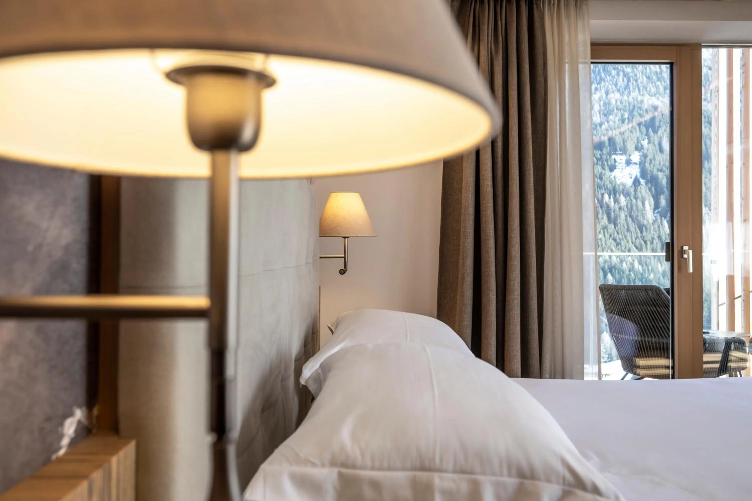 Bed in Ciampedie Luxury Alpine Spa Hotel