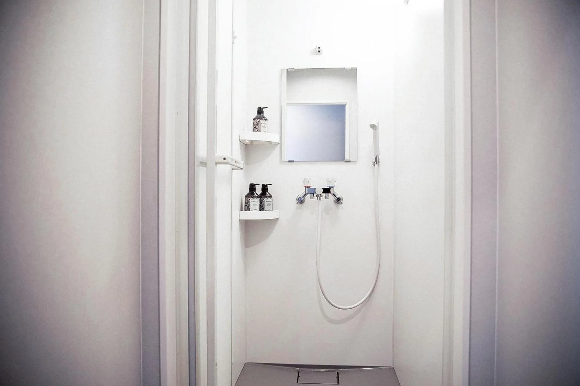 Shower in The Apartment Hotels KOU