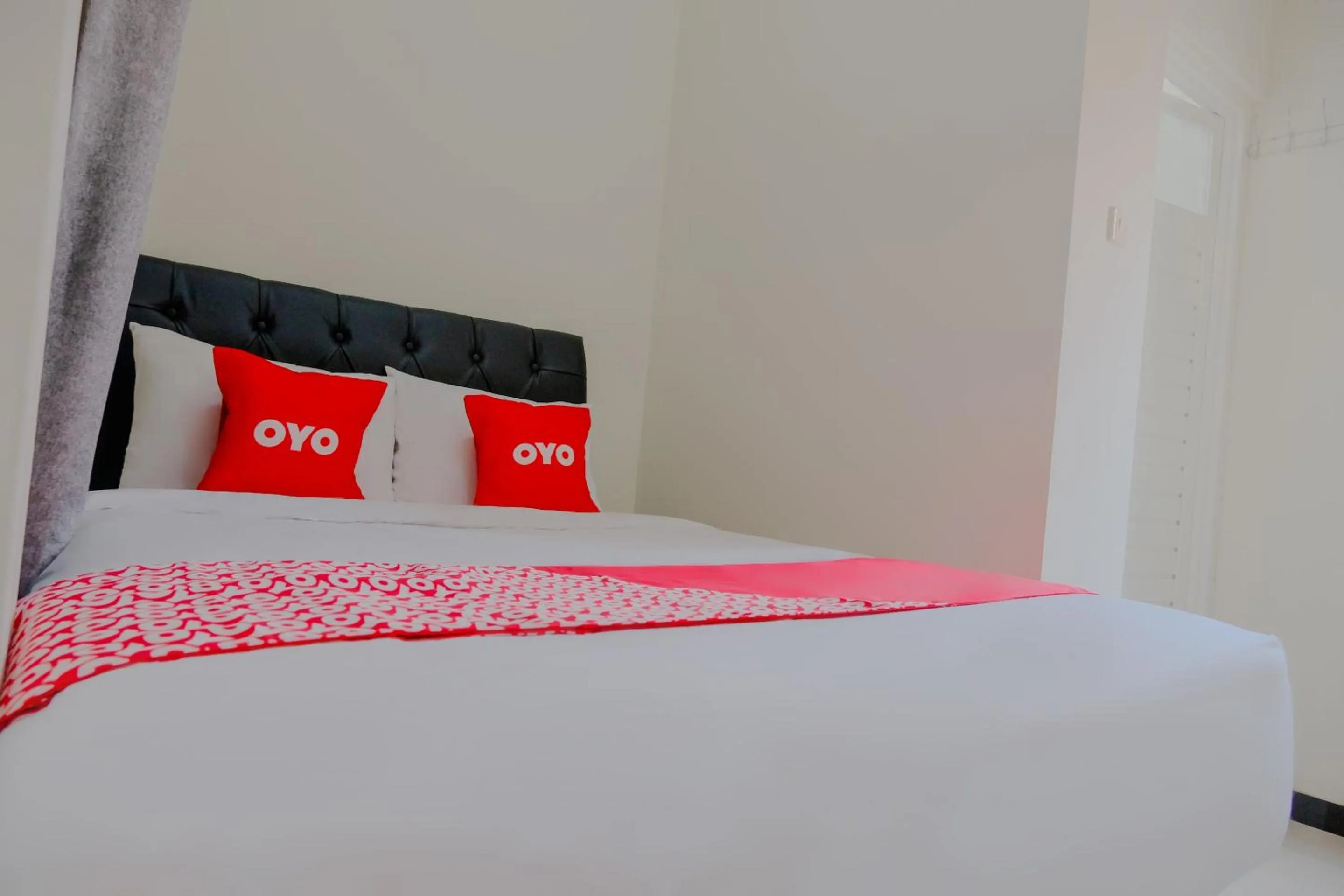 Bedroom in OYO 2376 Tiara Family Residence