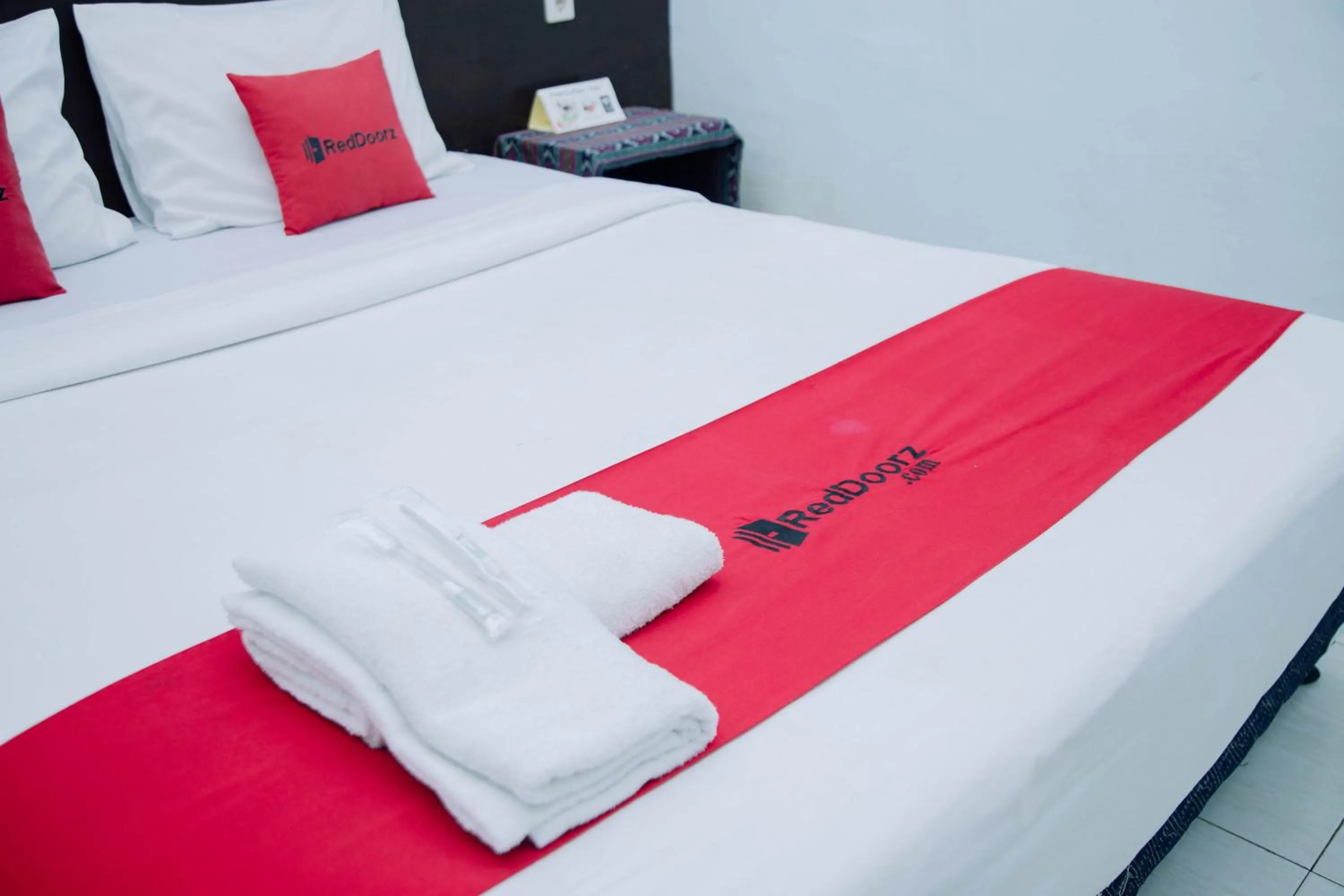 Bedroom, Bed in RedDoorz at Hening Homestay