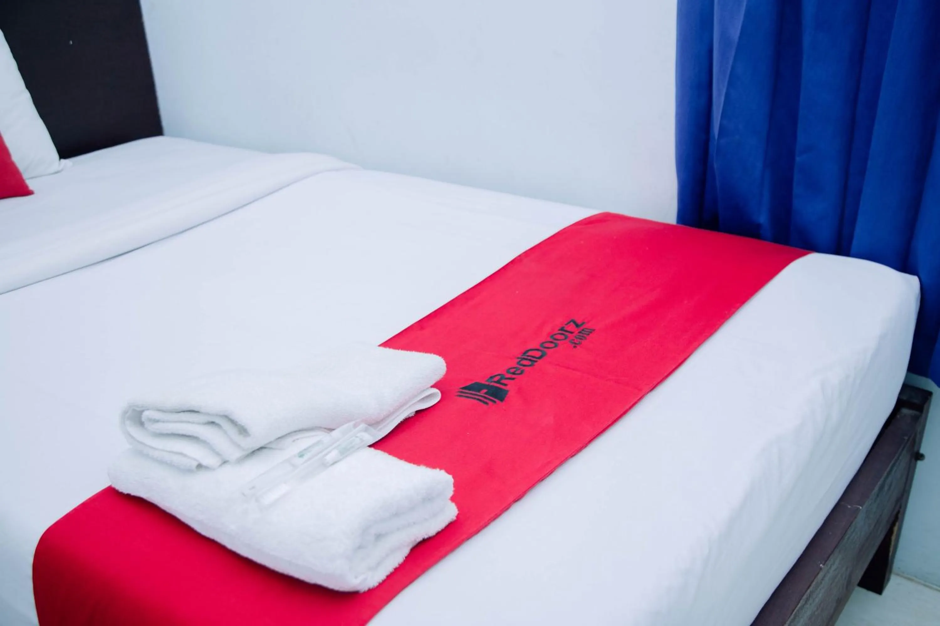 Bedroom, Bed in RedDoorz at Hening Homestay