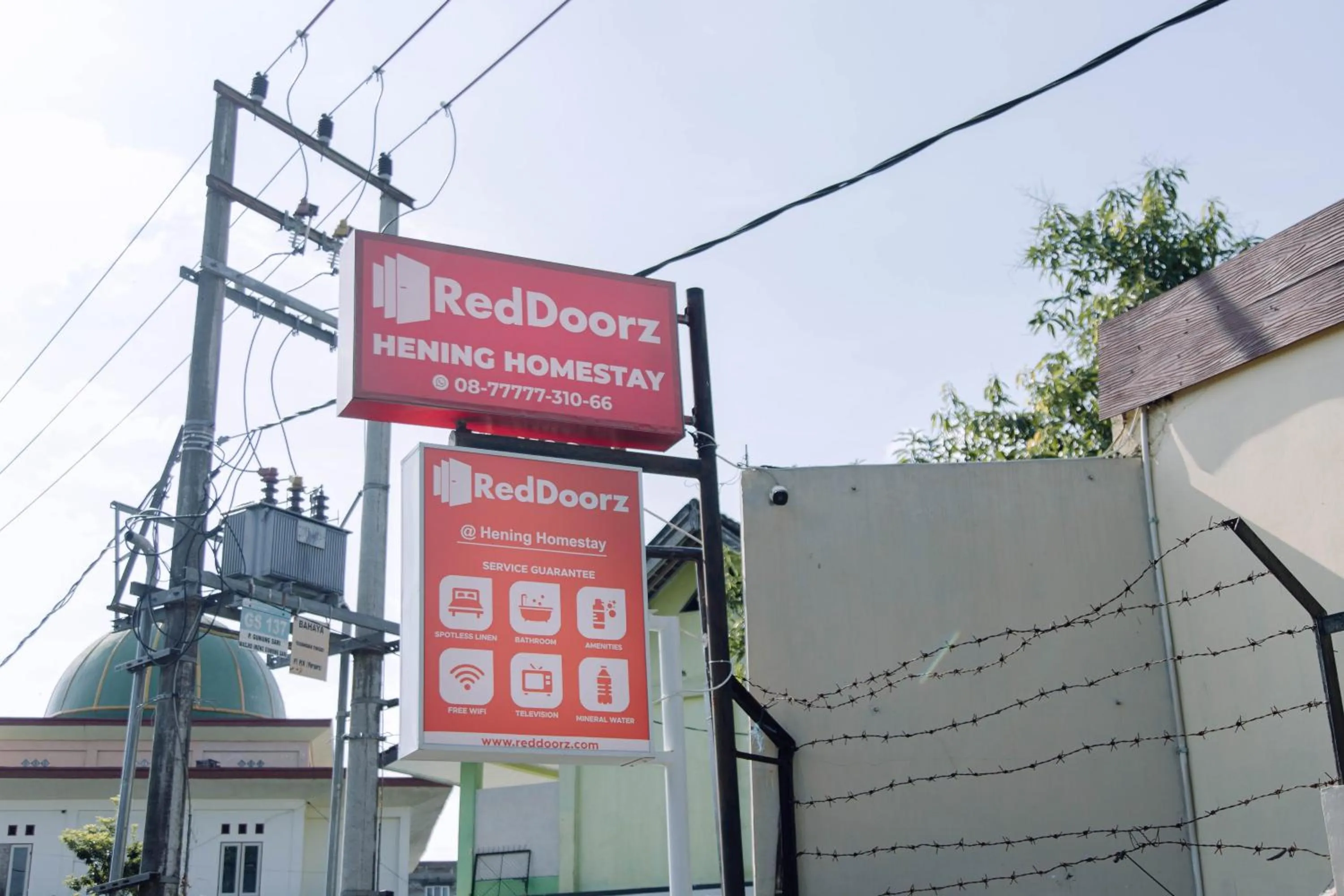 Property logo or sign in RedDoorz at Hening Homestay