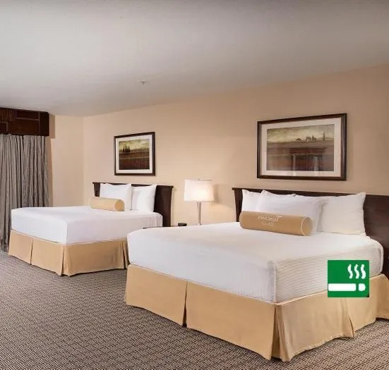 Bed in Tuscany Suites & Casino