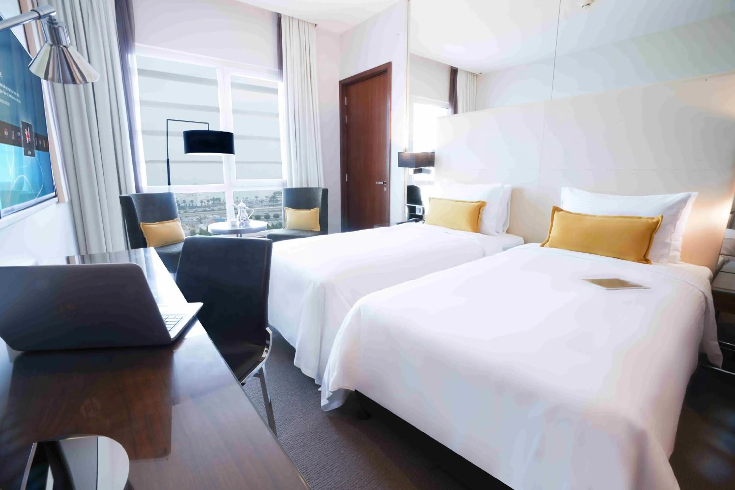 Bed in Centro Corniche Al Khobar by Rotana