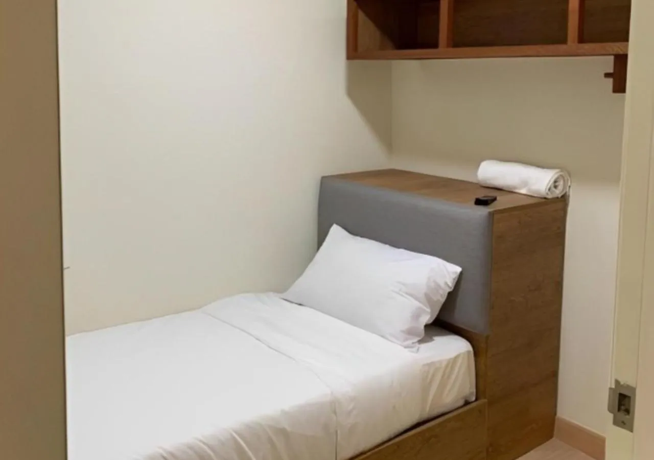 Bed in Timurbay Seafront Residence & Suites