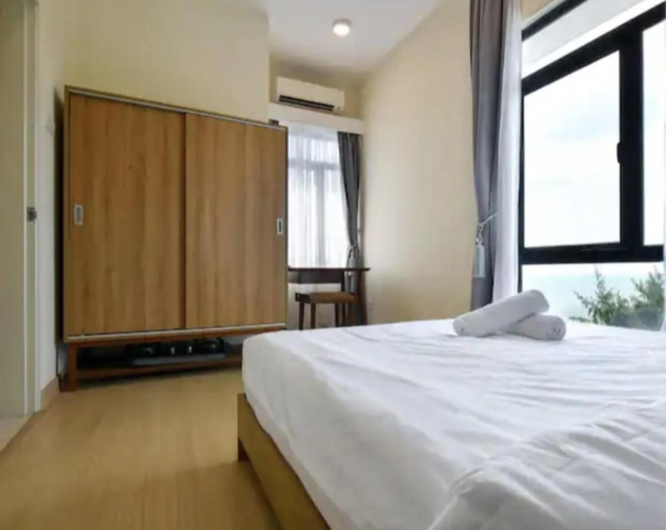 Bed in Timurbay Seafront Residence & Suites