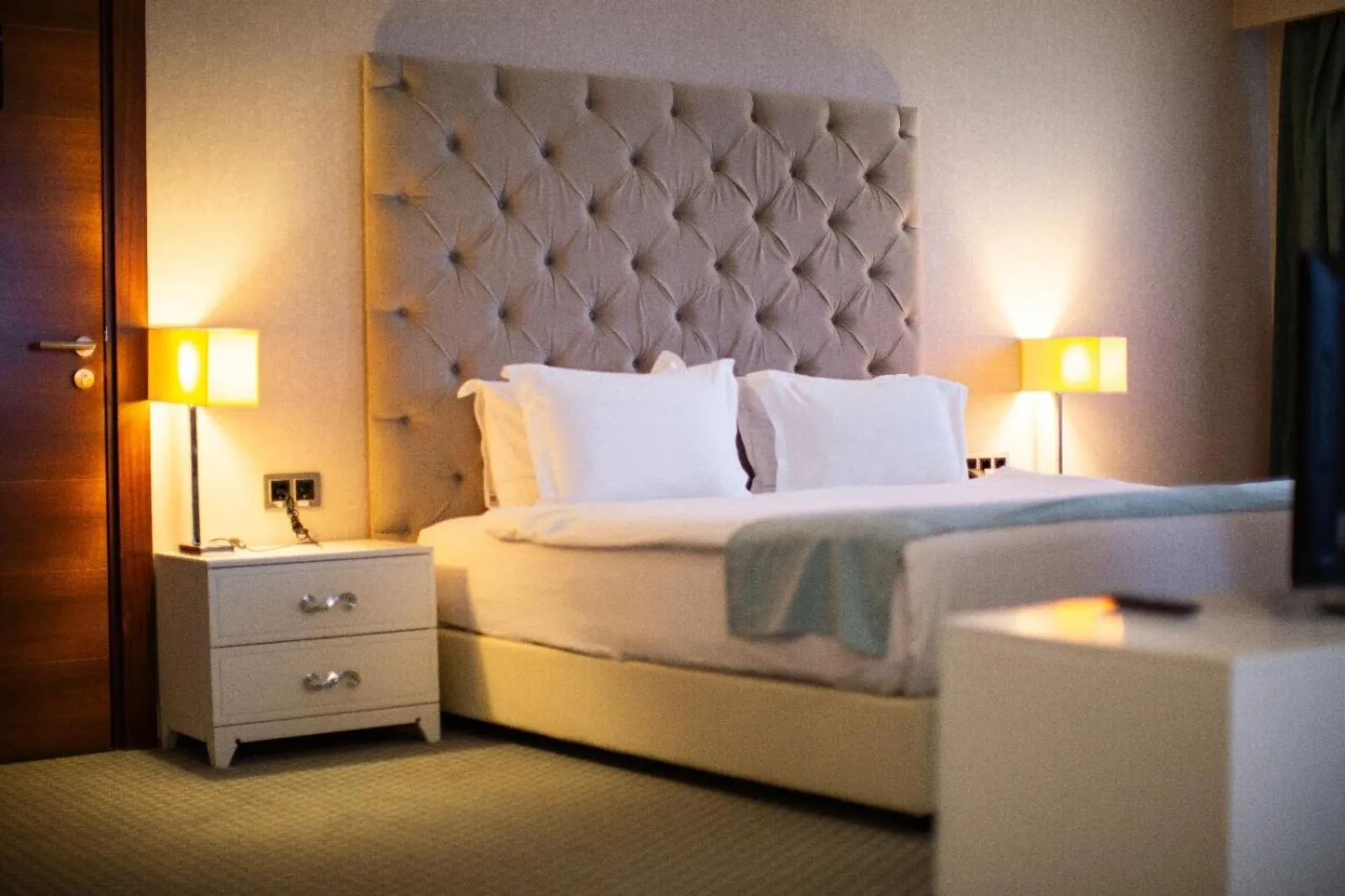 Bed in Nevali Hotel & Convention Center