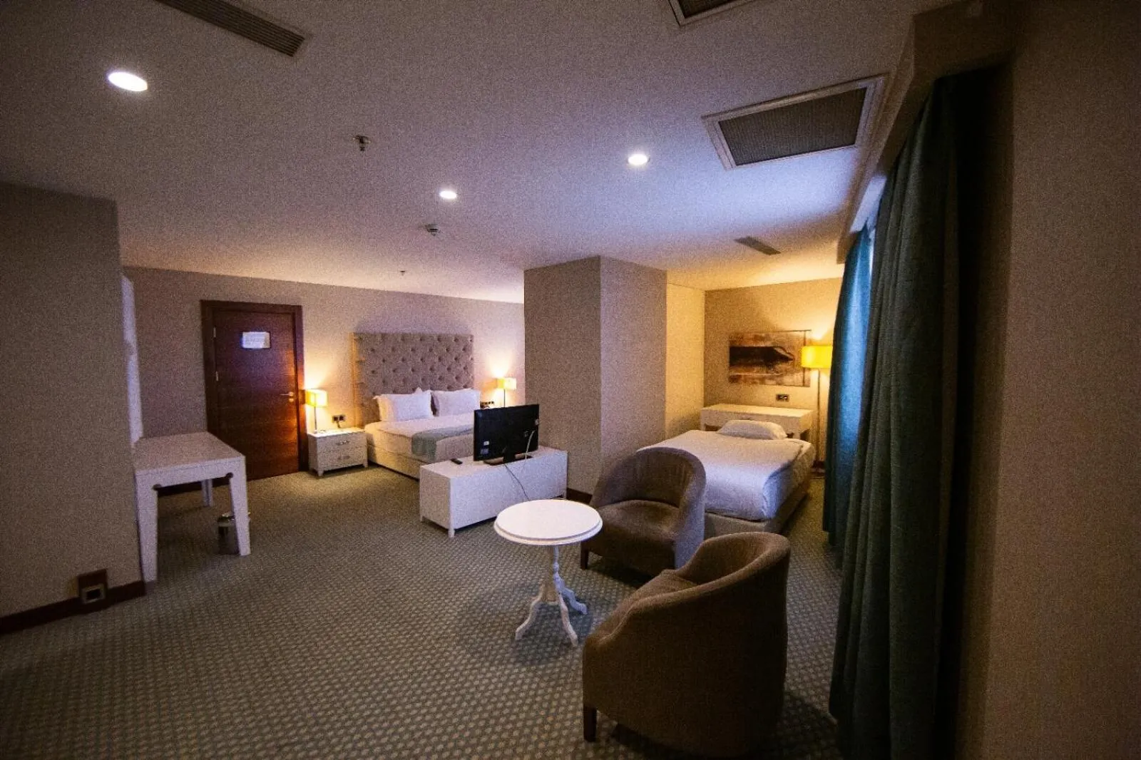 Bed in Nevali Hotel & Convention Center