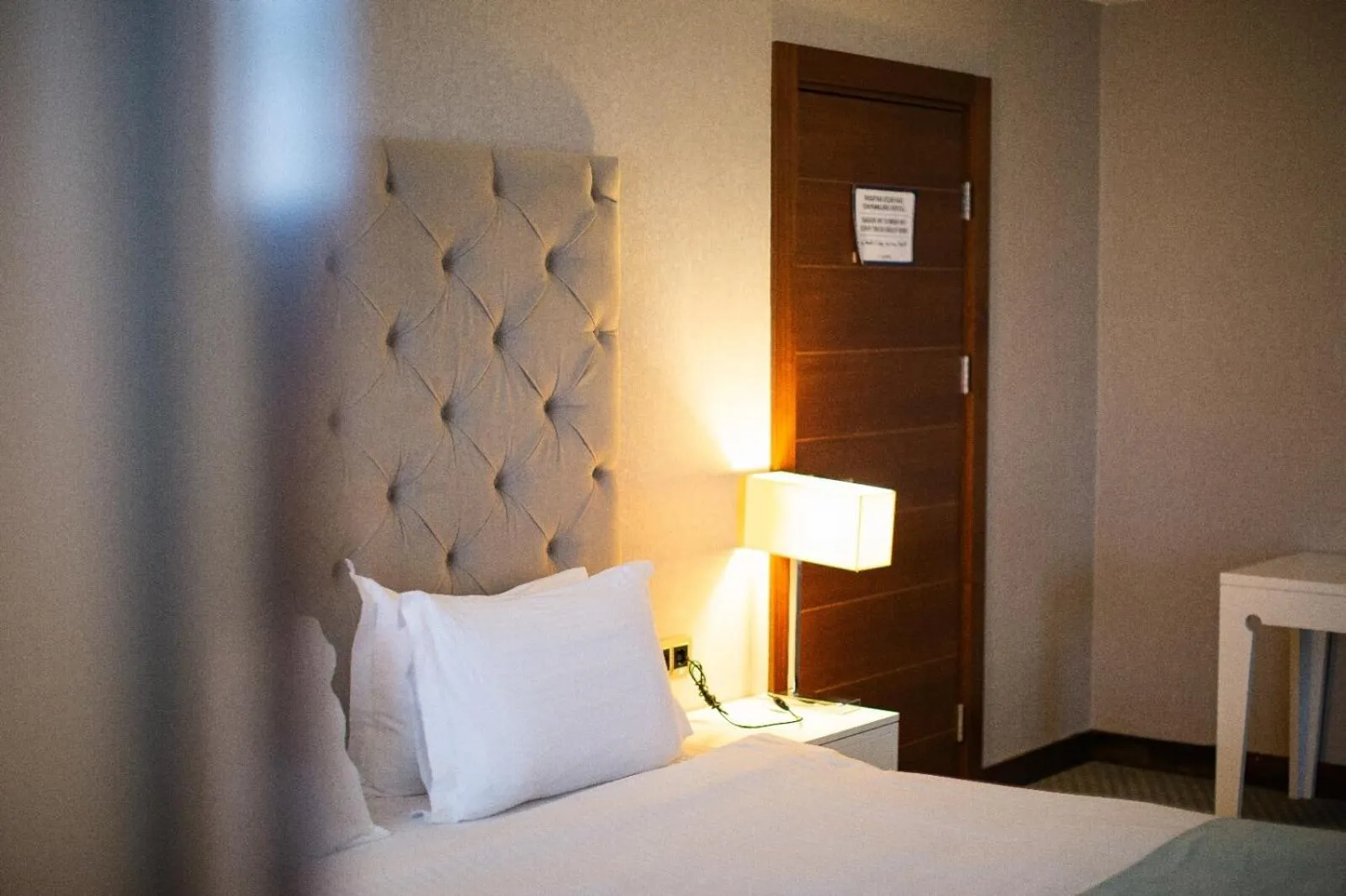Bed in Nevali Hotel & Convention Center