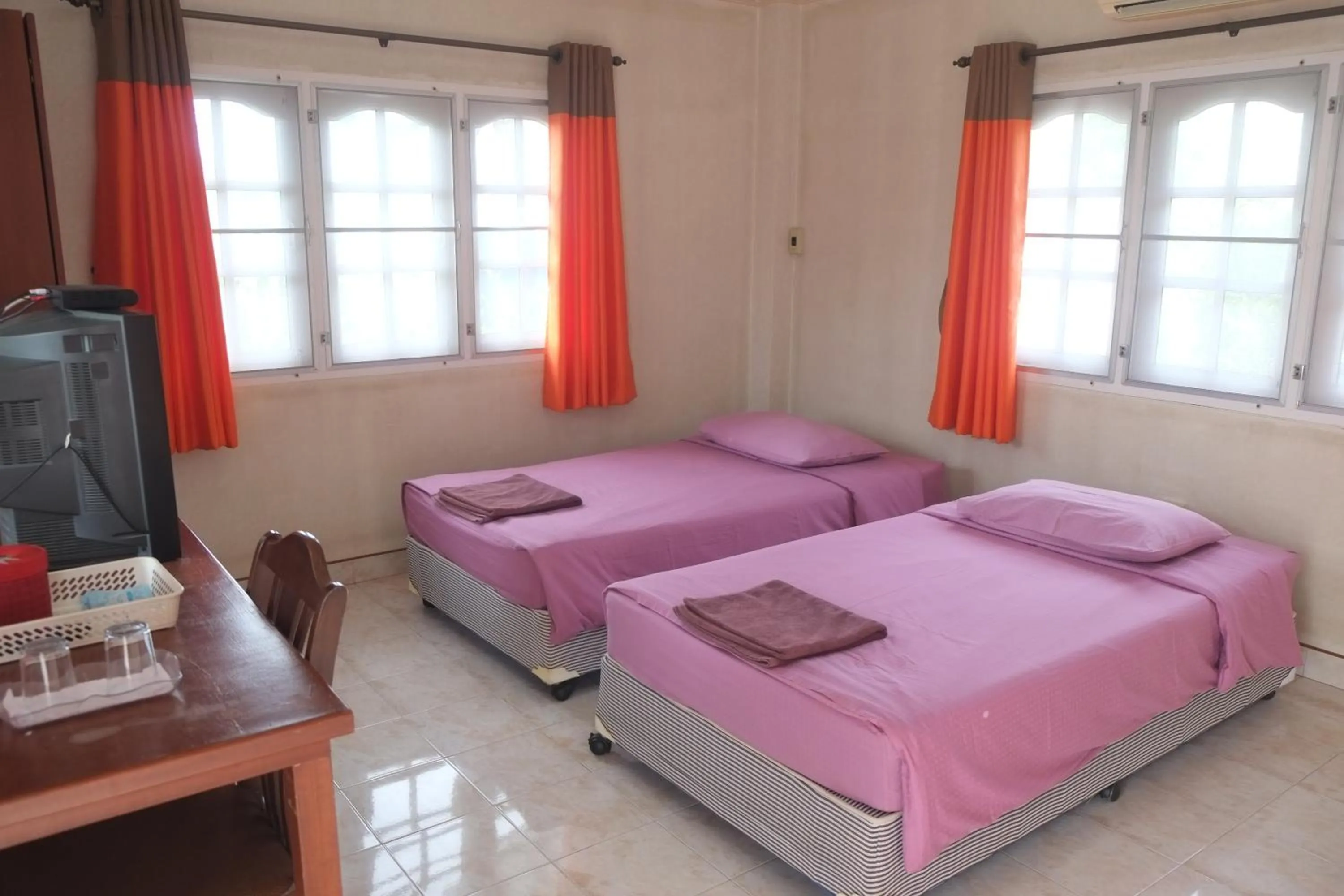 Bed in Baan Chom Chan Resort