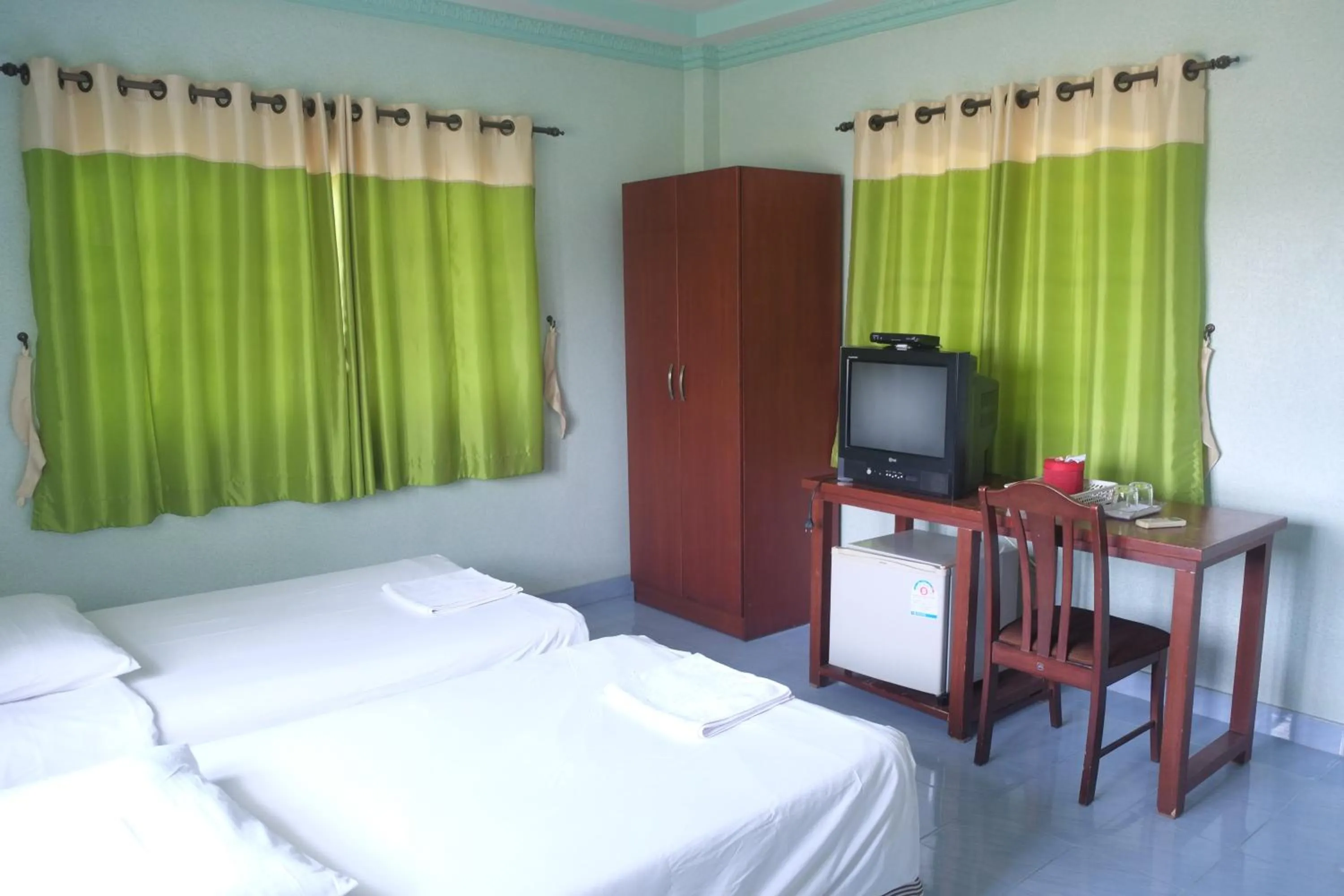 Bed in Baan Chom Chan Resort