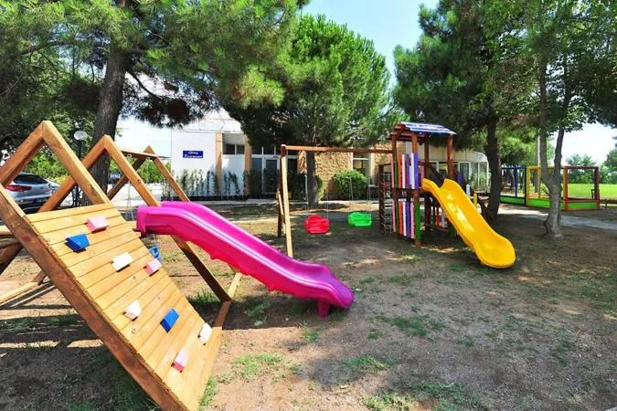Children play ground in Afytos Akcay Tatil Koyu