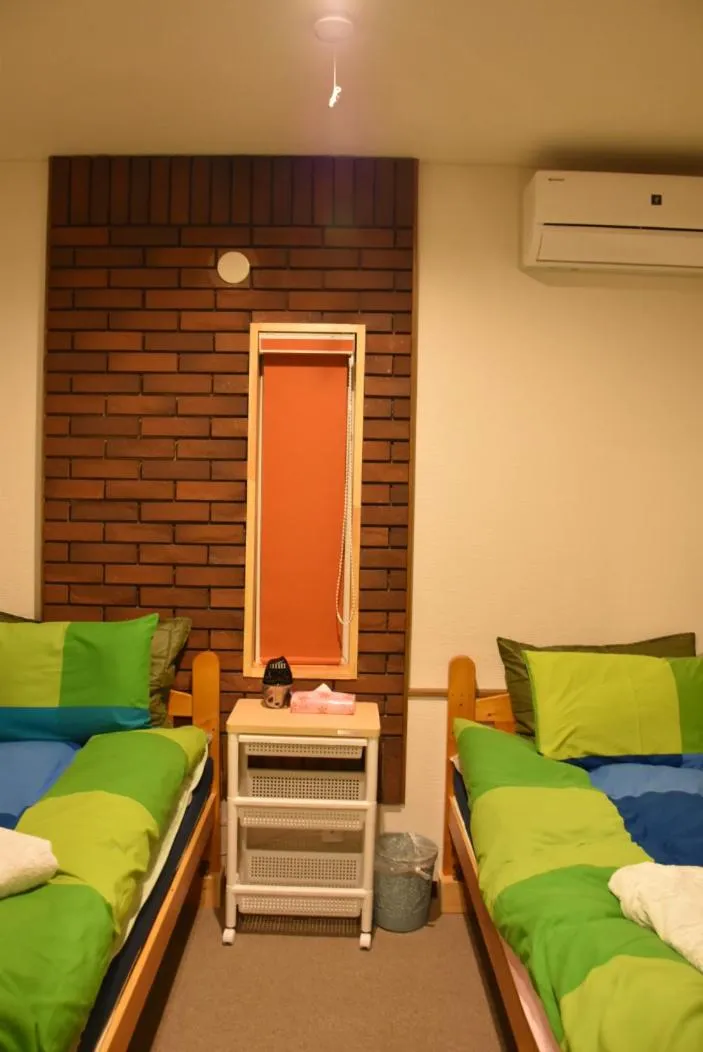 Bed in Niseko Hirafu Tsukushi