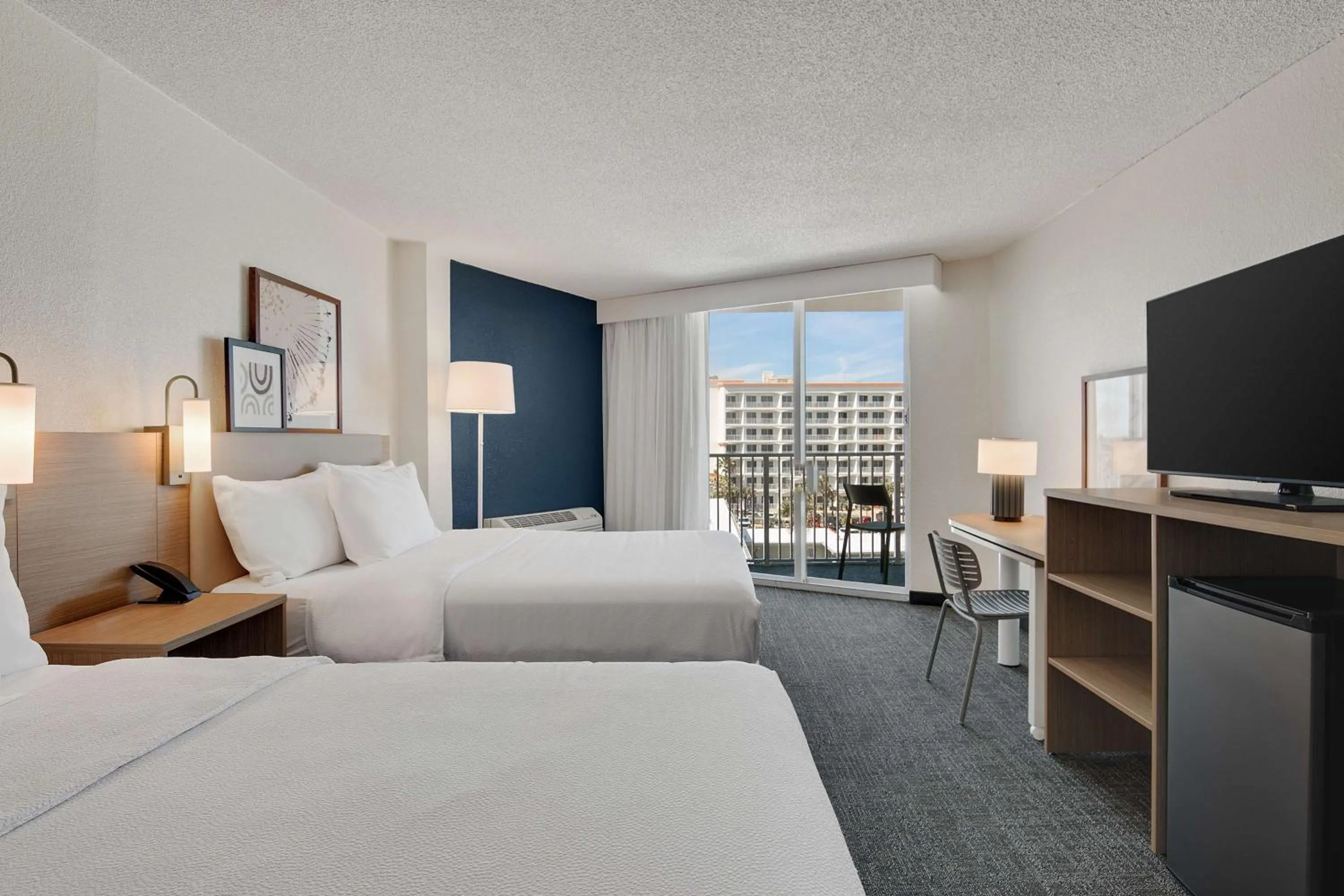 Bed in Spark by Hilton Ormond Beach Oceanfront