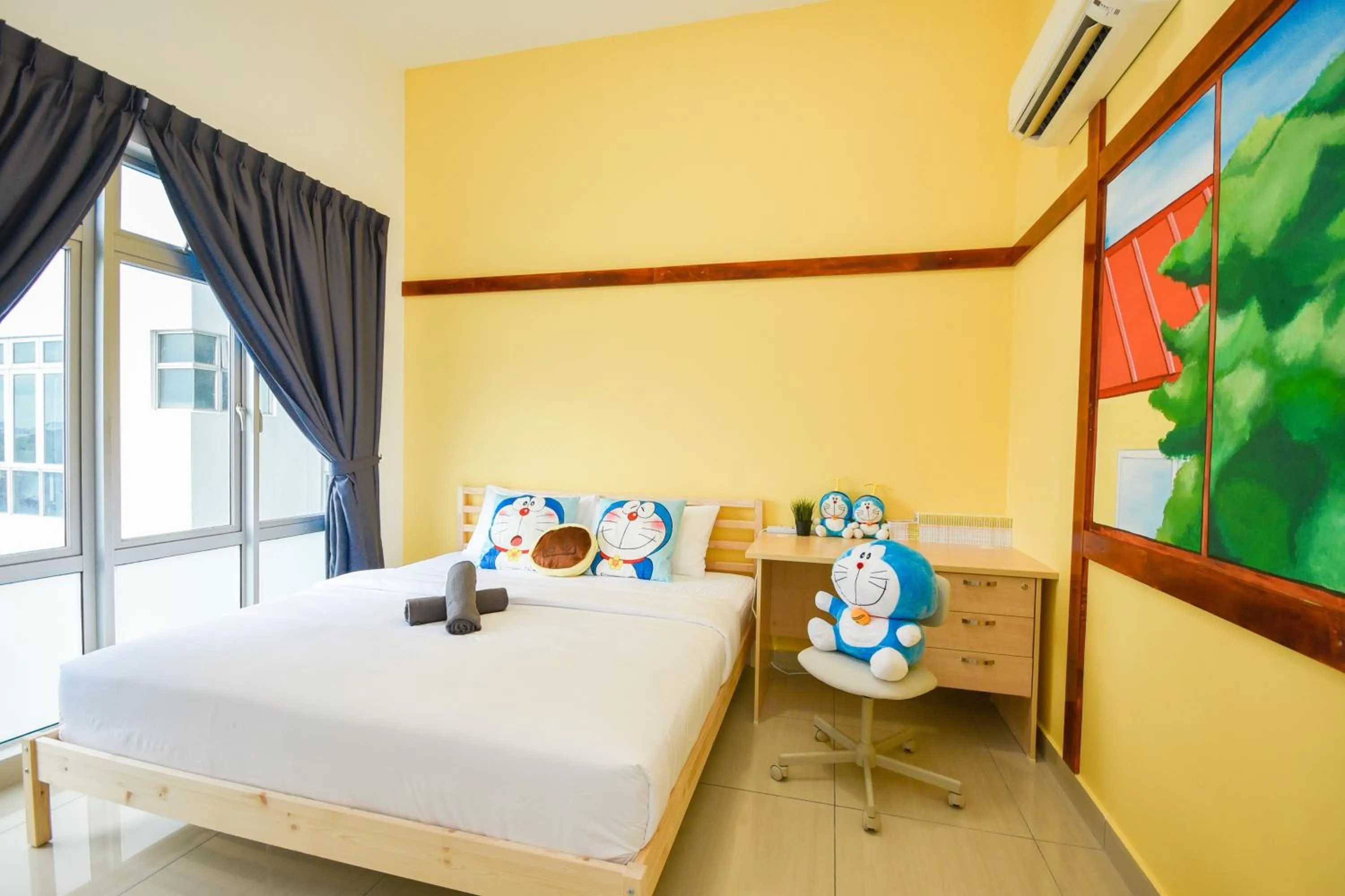 Bed in Manhattan Theme Suite by Nest Home at Austin Heights