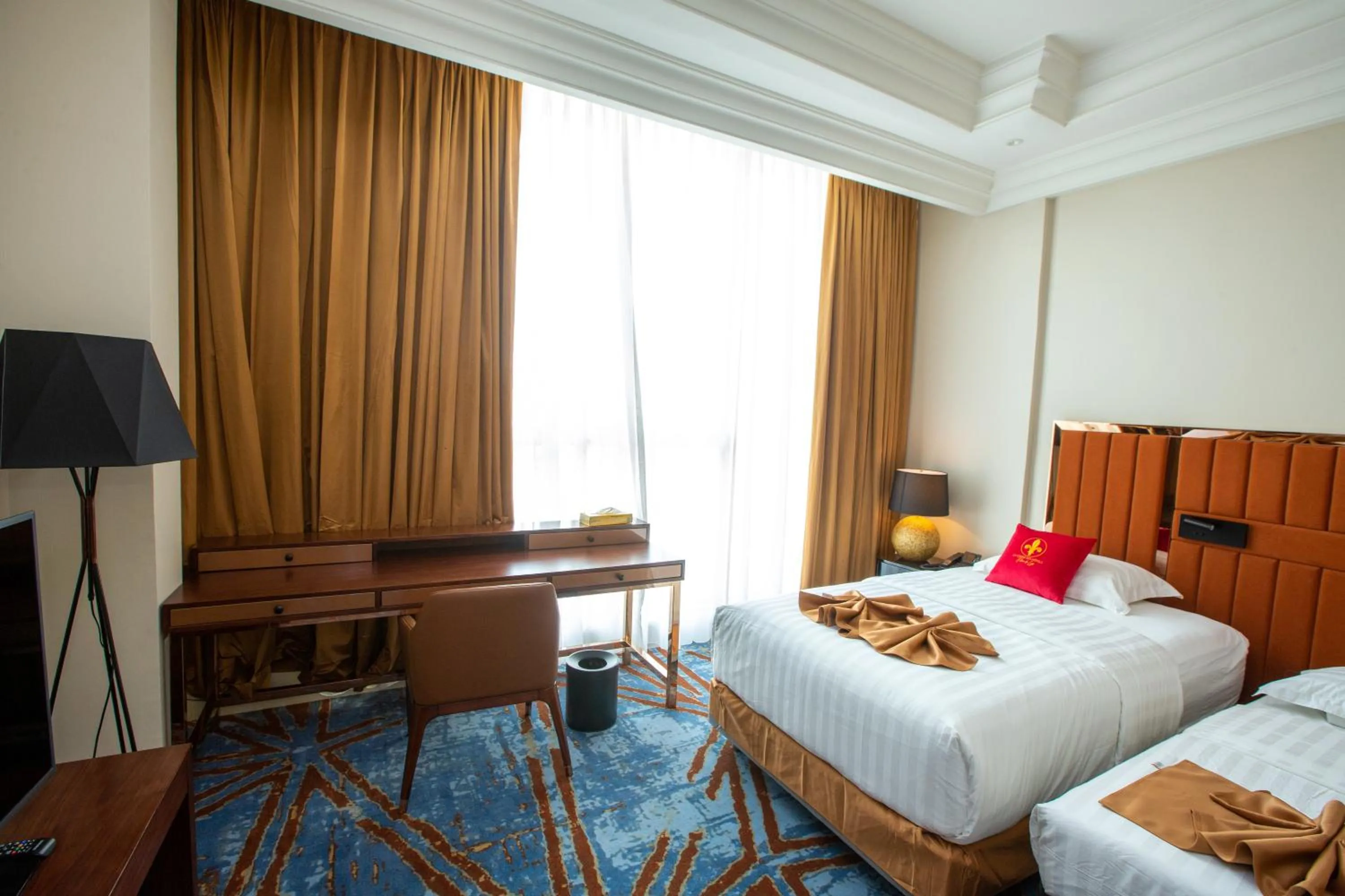 Bed in Hôtel Fleur de Lys Point E