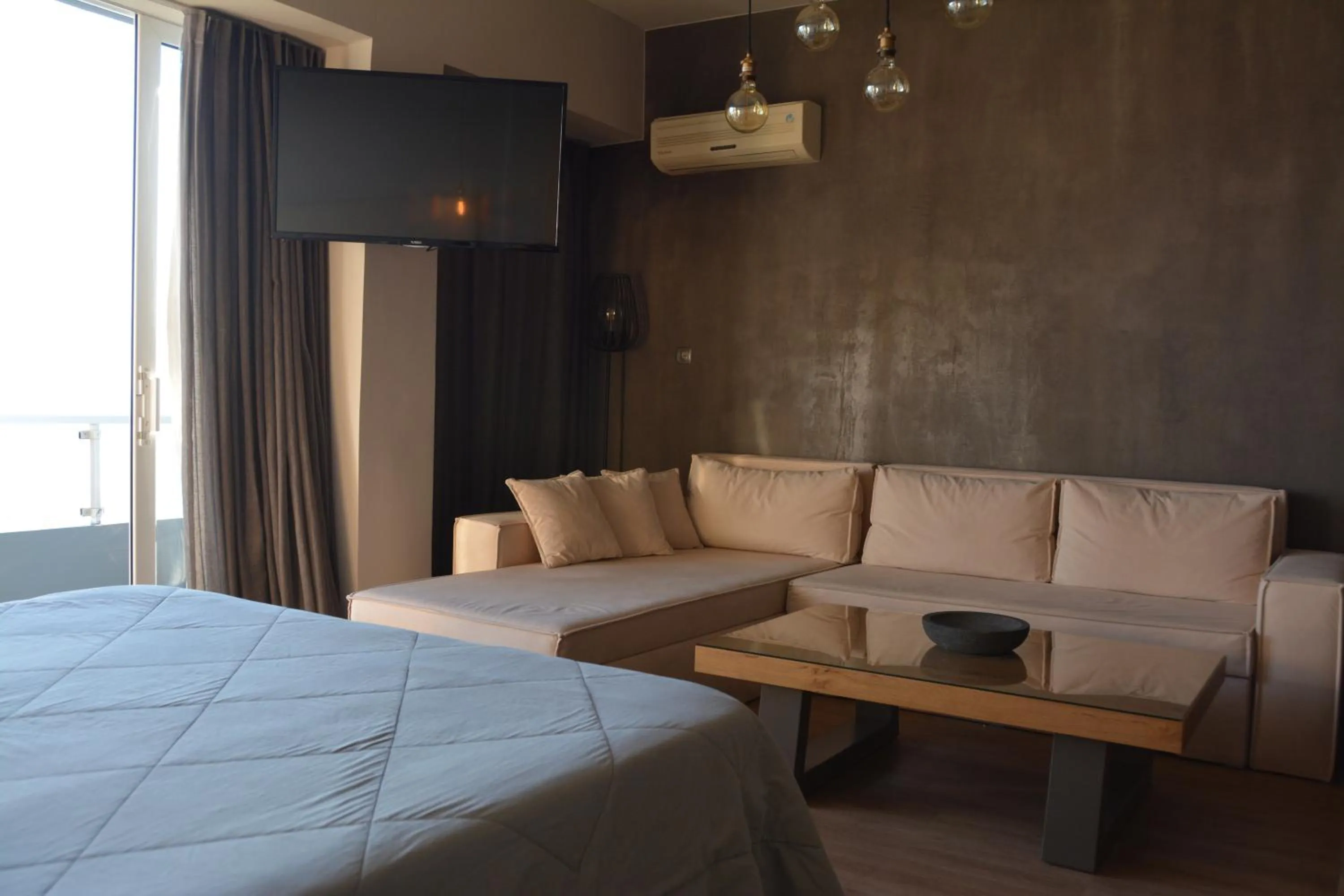 Bed in Scorpios Sea Side Hotel