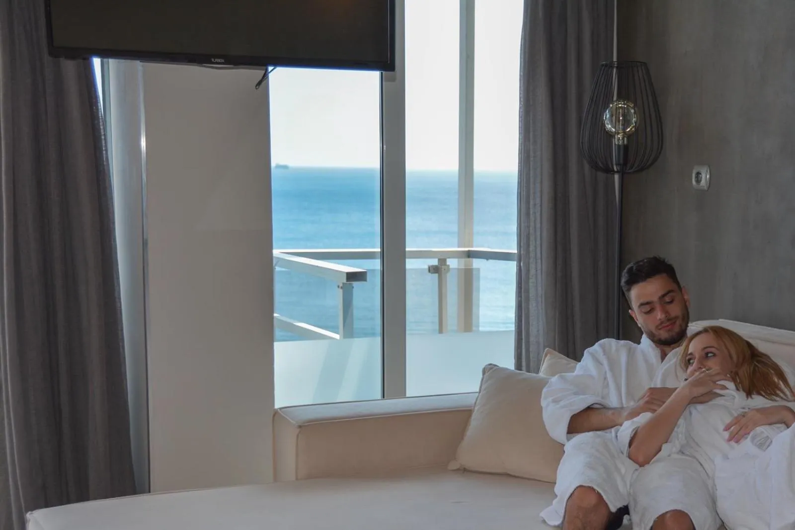 Bed in Scorpios Sea Side Hotel