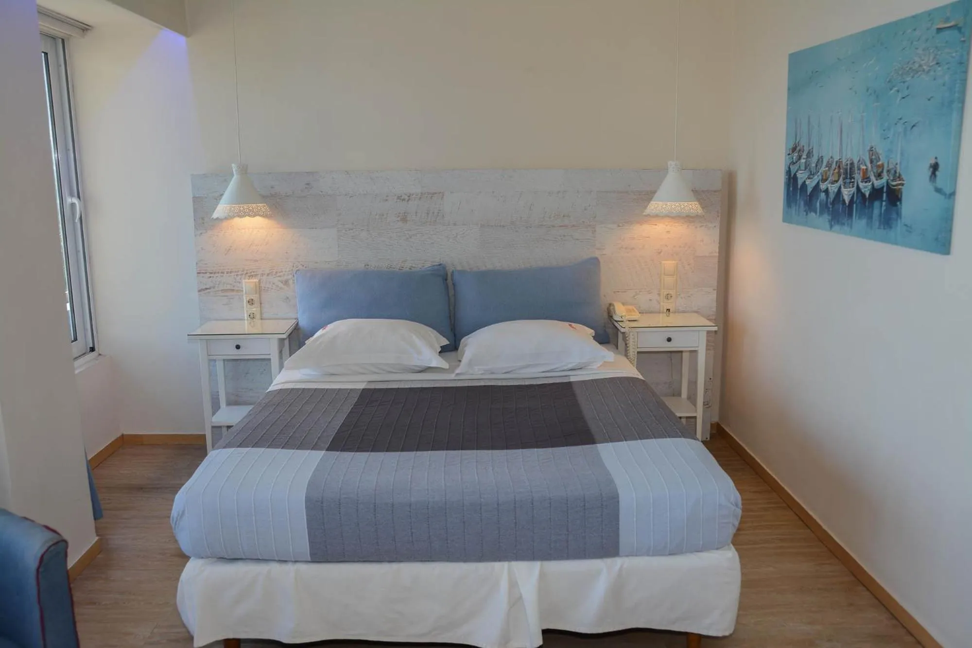 Bed in Scorpios Sea Side Hotel